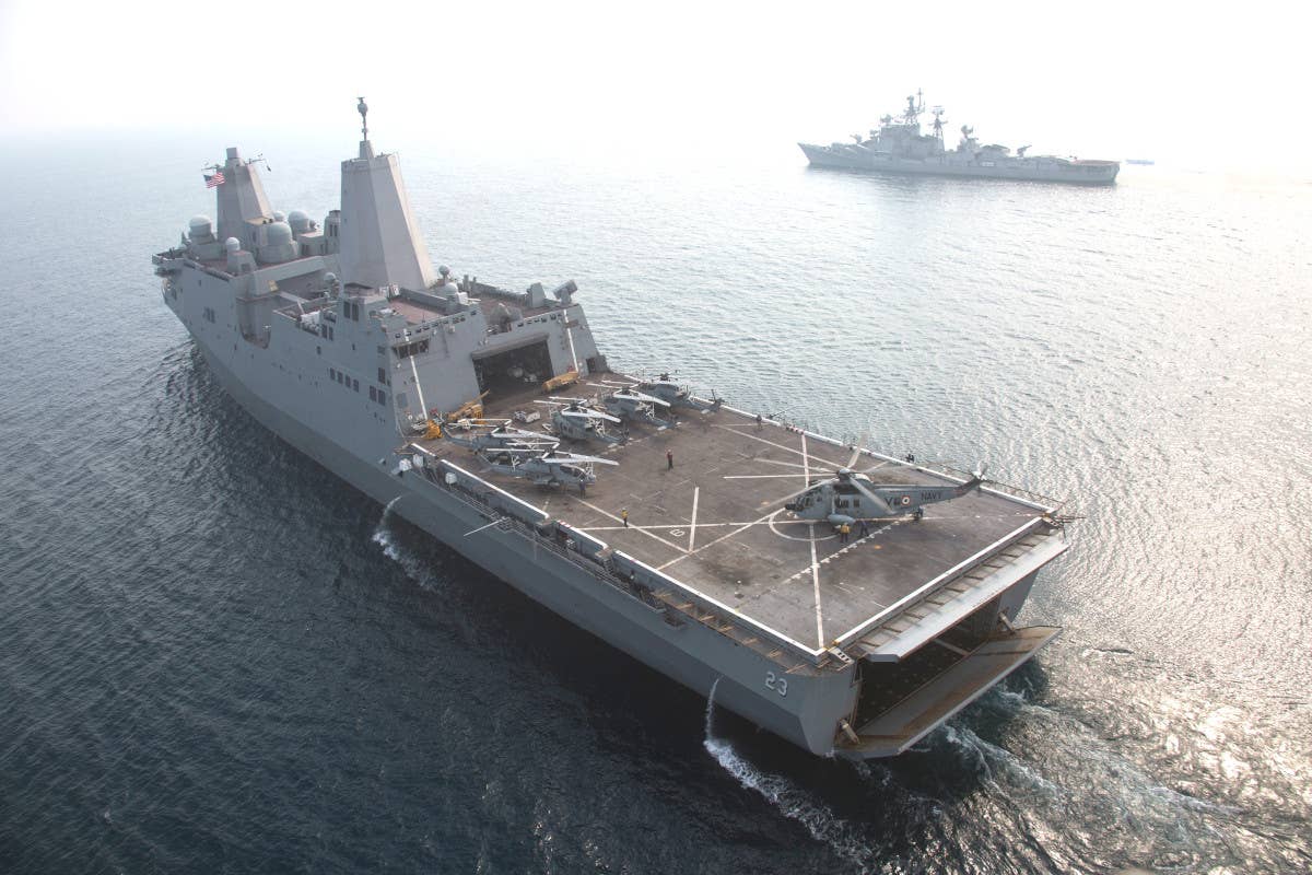 A picture of the <em>San Antonio</em> class amphibious warship USS <em>Anchorage</em> offering a good look at the original two-part stern gate design. <em>USN</em>