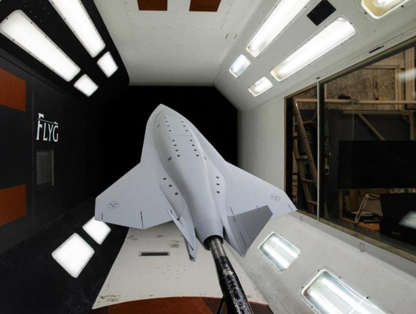A full view of the Saab Loyal Wingman concept in the L-2000 Wind tunnel at the Royal Technical High School, Stockholm. <em>Saab via X</em>