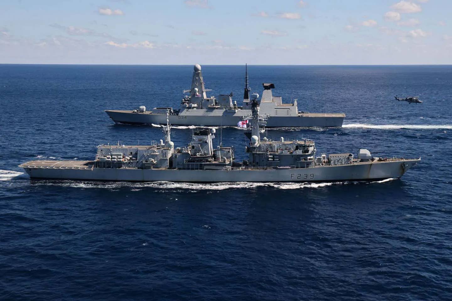 HMS <em>Diamond</em> passes its replacement, HMS <em>Richmond</em>. (Royal Navy)