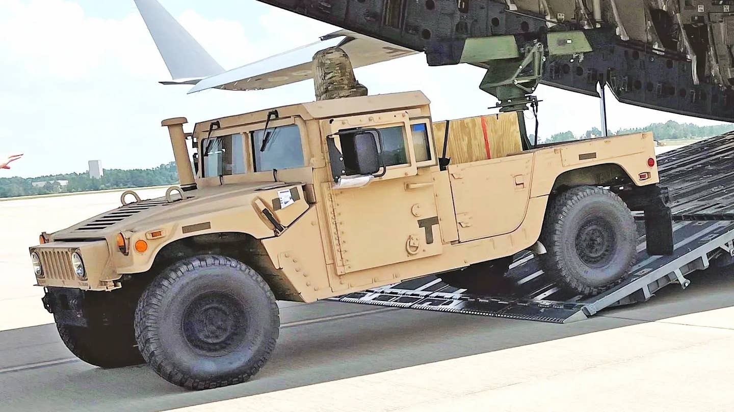 An M1152A1 Humvee-based VAMPIRE system being loaded onto a US Air Force C-17 cargo aircraft in the United States for subsequent deliver to Ukraine. <em>USN</em>