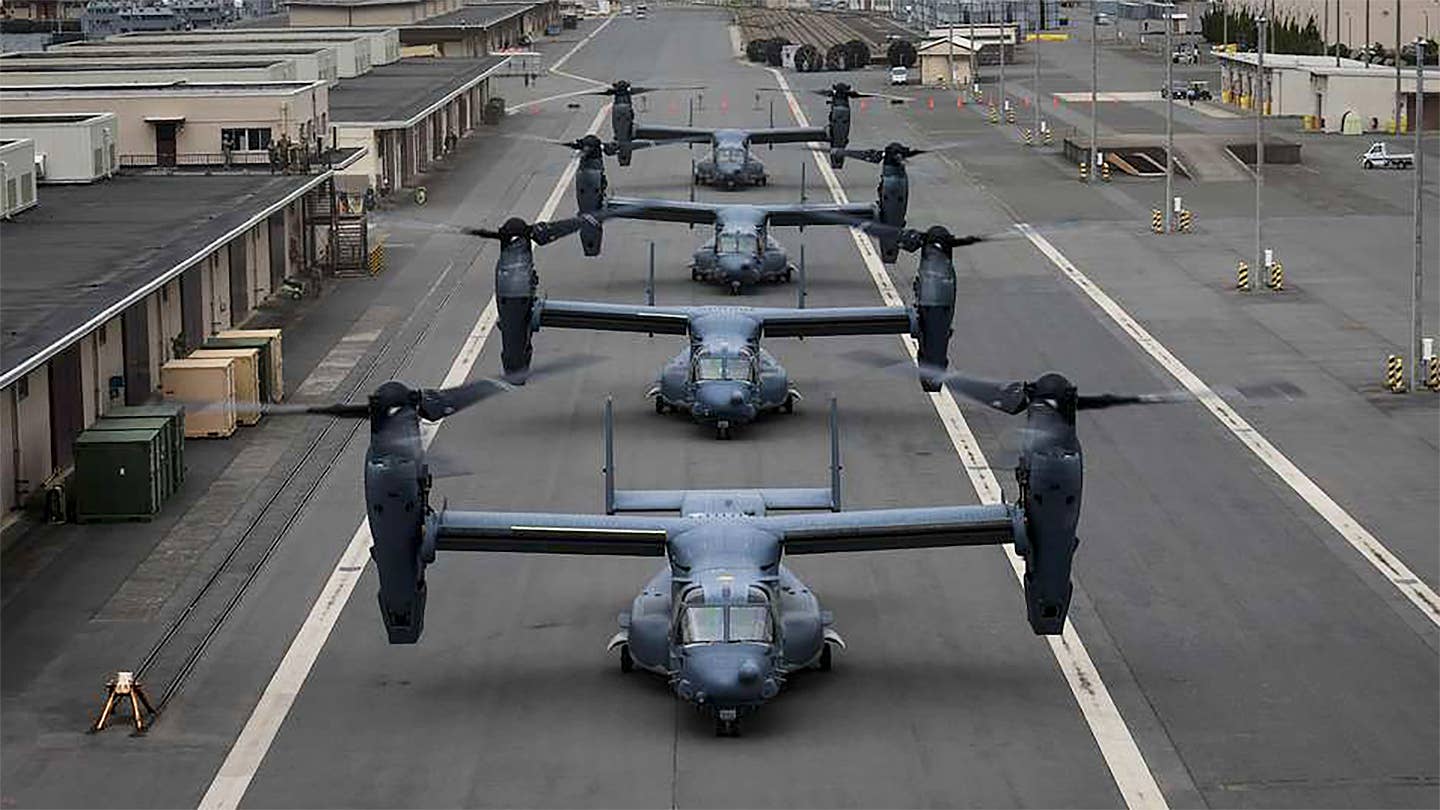 CV-22s taxi for takeoff