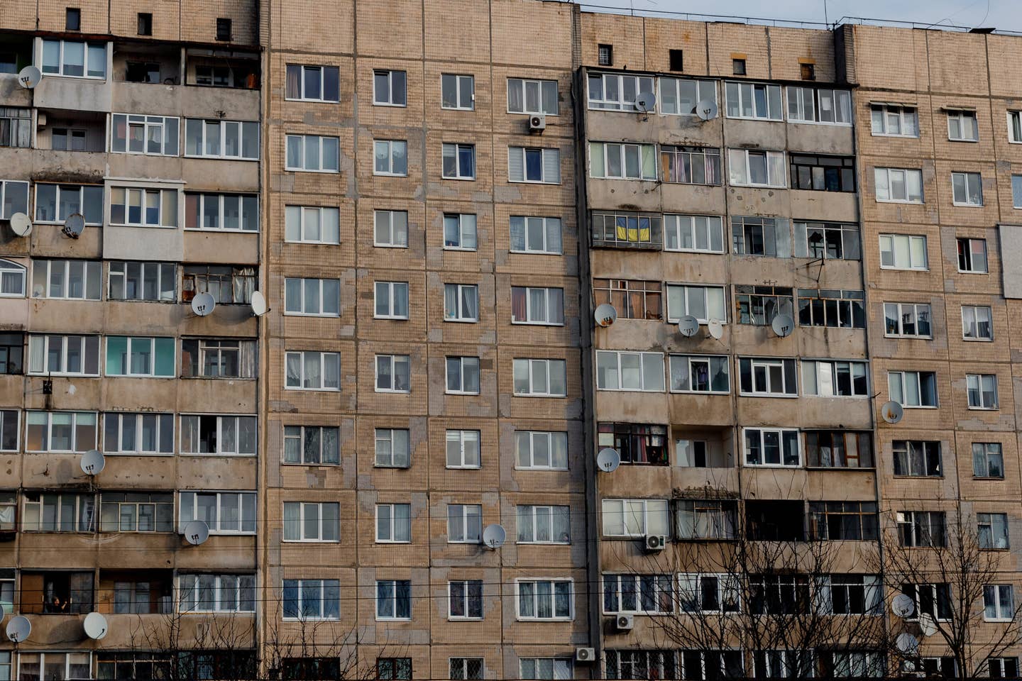 A multi-story residential building stands with broken windows following a missile strike on February 15, 2024, in Lviv, Ukraine. <em>Photo by Anna Srogui/Suspilne Ukraine/JSC/Global Images Ukraine via Getty Images</em>
