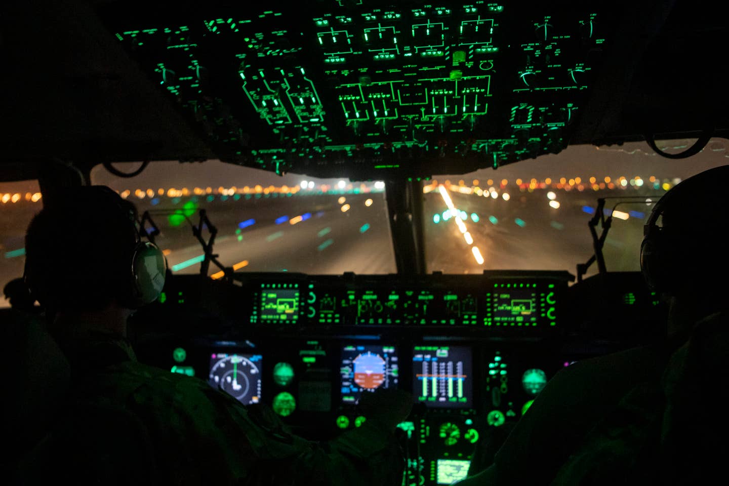 U.S. Air Force C-17 Globemaster III pilots, assigned to the 816th Expeditionary Airlift Squadron, takeoff for a mission at Al Udeid Air Base, Qatar, Oct. 27, 2020.  (U.S. Air Force photo by Master Sgt. Larry E. Reid Jr.)