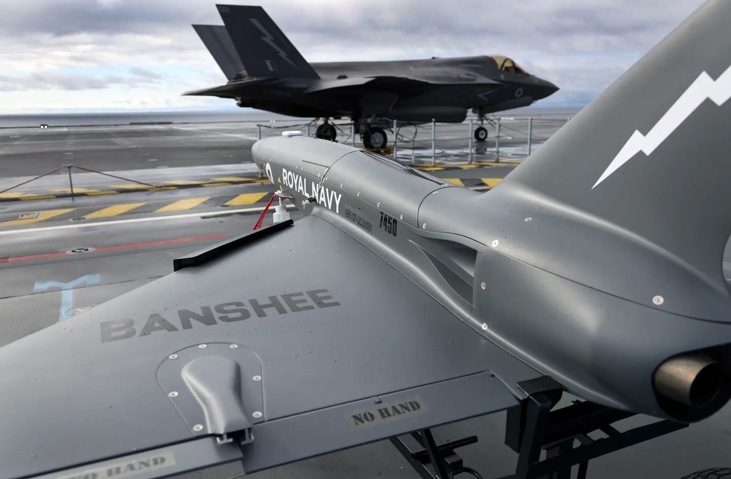 A Banshee target drone and an F-35B stealth fighter on the deck of HMS&nbsp;<em>Prince of Wales</em>.&nbsp;<em>Crown Copyright</em>