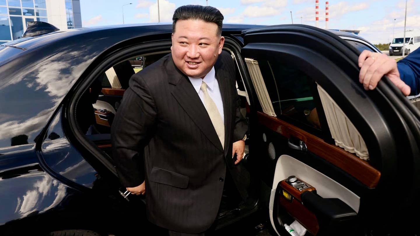 North Korean leader Kim Jong Un pictured emerging from Russian President Putin's armored limo