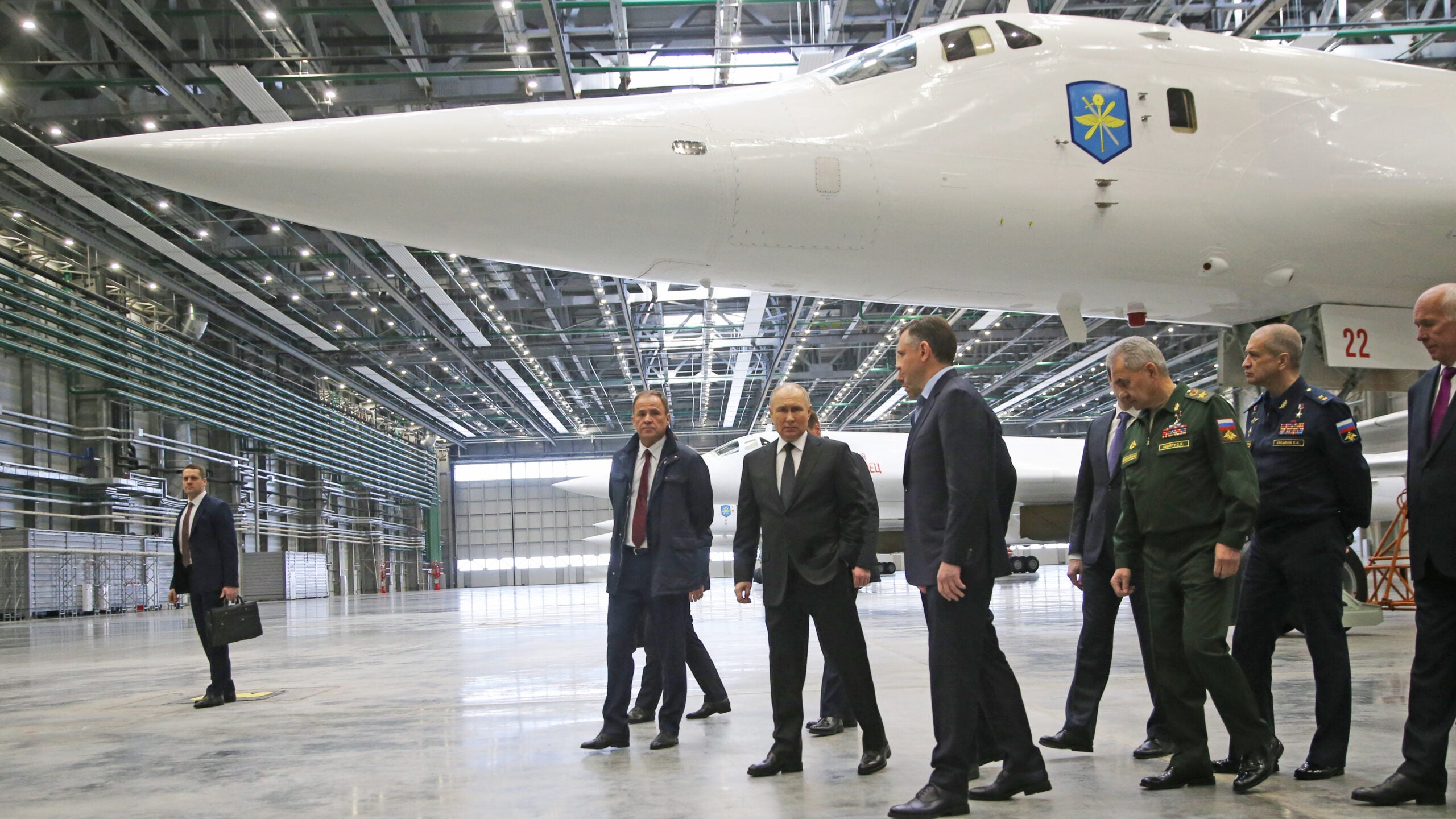 KAZAN, RUSSIA - FEBRUARY 21: (RUSSIA OUT) Russian President Vladimir Putin (C) observes a Tupolev TU-160 strategic jet bomber while visiting an aviation plant on February 21, 2024, in Kazan, Russia. Putin is embarking on a two-day trip to Kazan ahead of the 2024 Presidential Elections, scheduled for March. (Photo by Contributor/Getty Images)