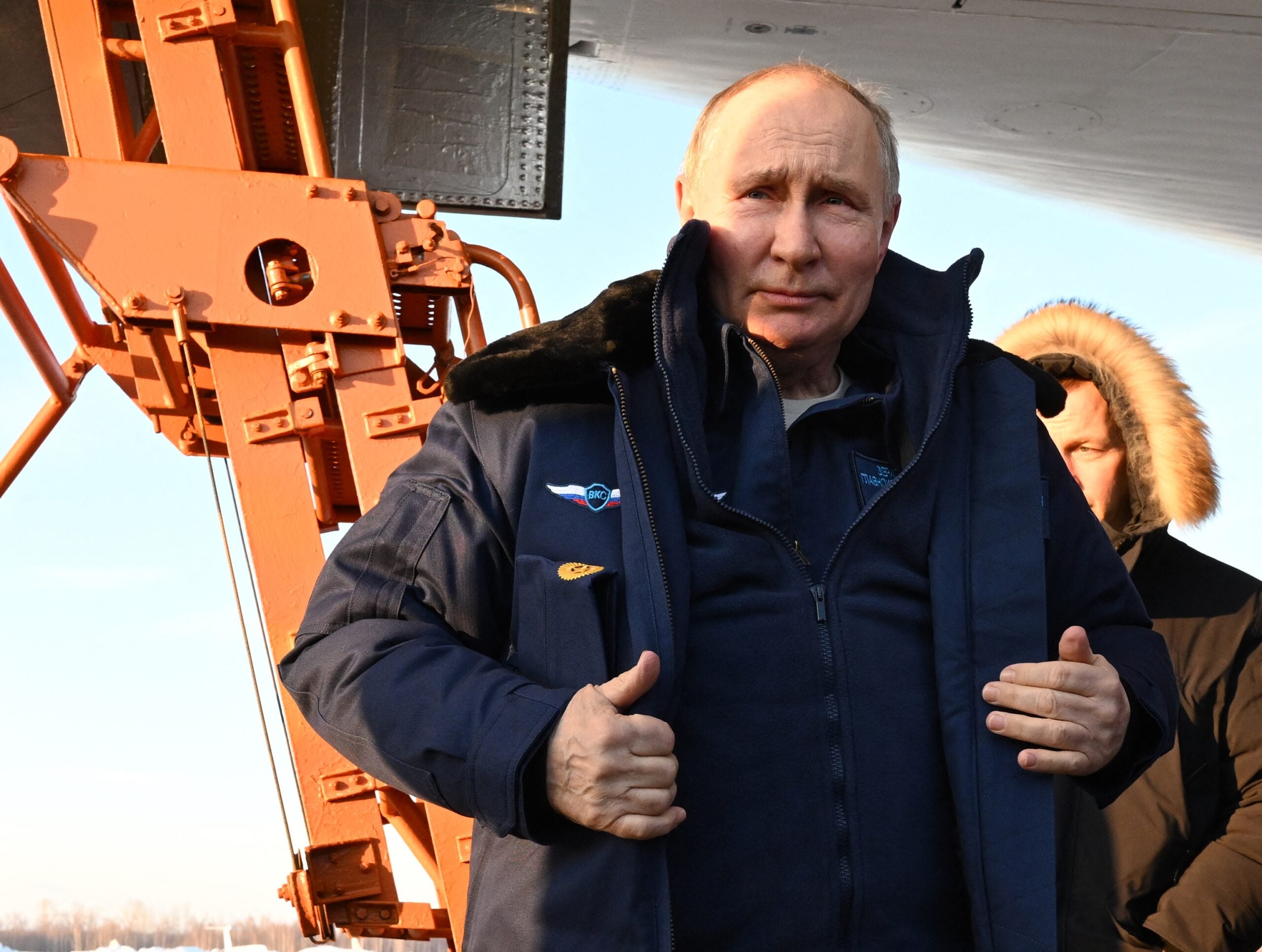 In this pool photograph distributed by Russian state agency Sputnik, Russia's President Vladimir Putin meets journalists after flying in a Tupolev Tu-160M strategic bomber in Kazan on February 22, 2024. (Photo by Dmitry AZAROV / POOL / AFP) (Photo by DMITRY AZAROV/POOL/AFP via Getty Images)