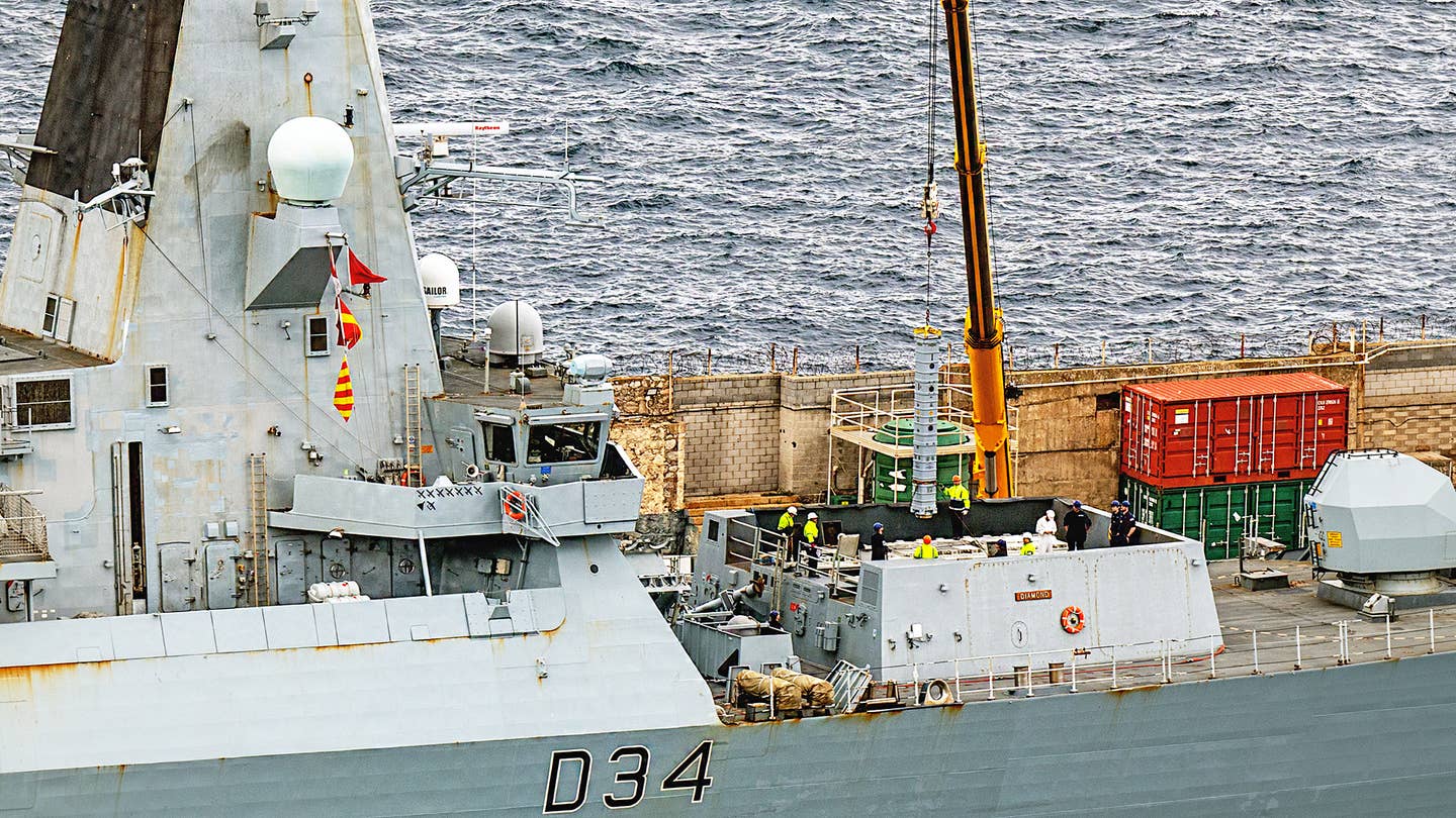 Sea Viper missiles being loaded onto HMS Diamond