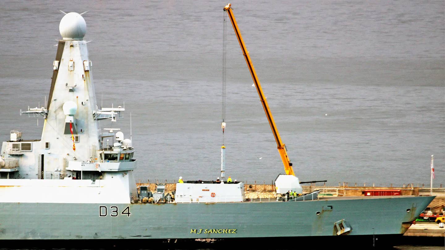 HMS <em>Diamond</em> pictured being rearmed in Gibraltar. <em>Michael J Sanchez/@key2med</em>