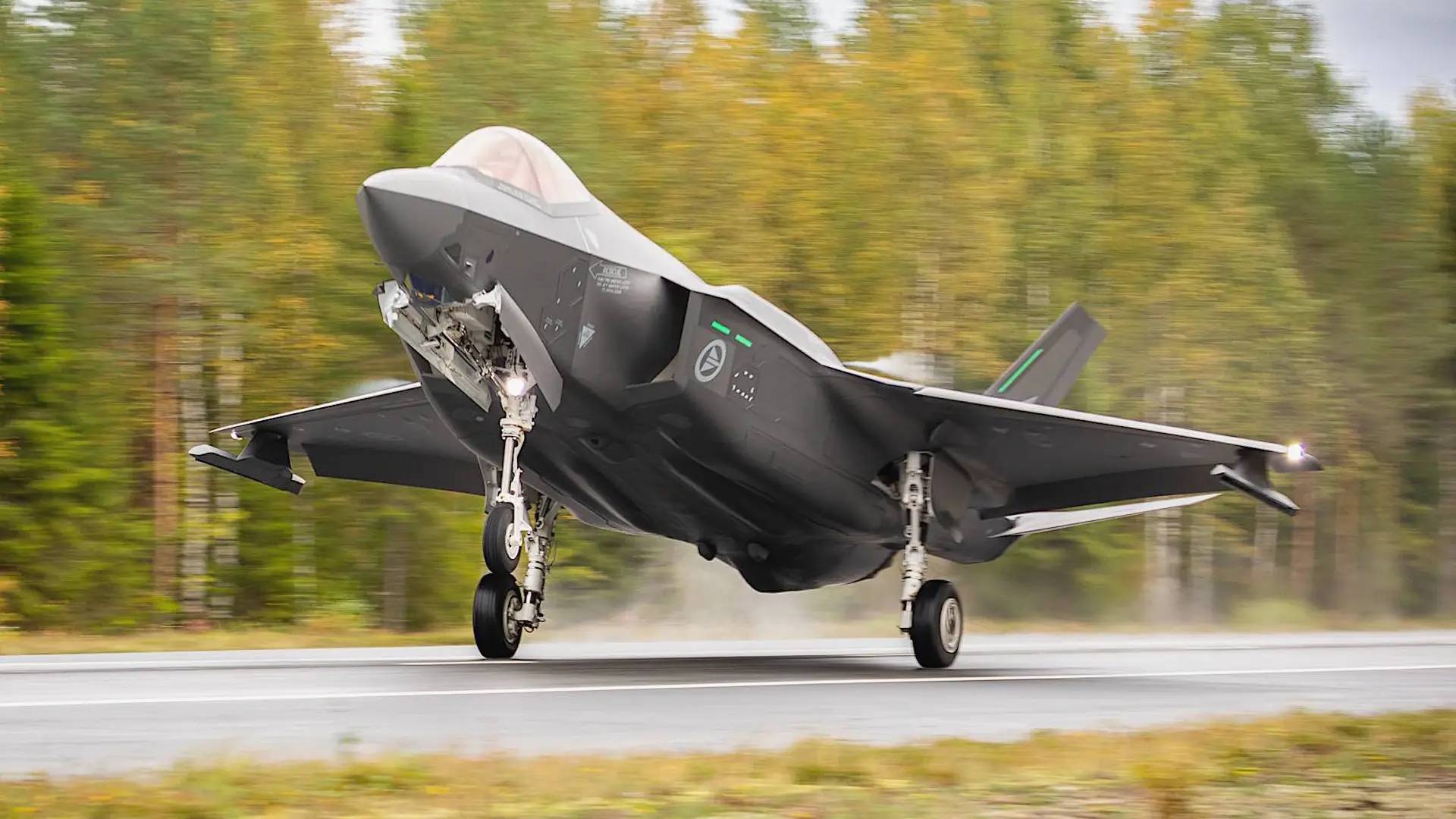 A Royal Norwegian Air Force F-35A demonstrates the ability of the conventional takeoff and landing Joint Strike Fighter to operate from a highway as part of an exercise in Finland in September 2023. <em>Forsvaret</em>