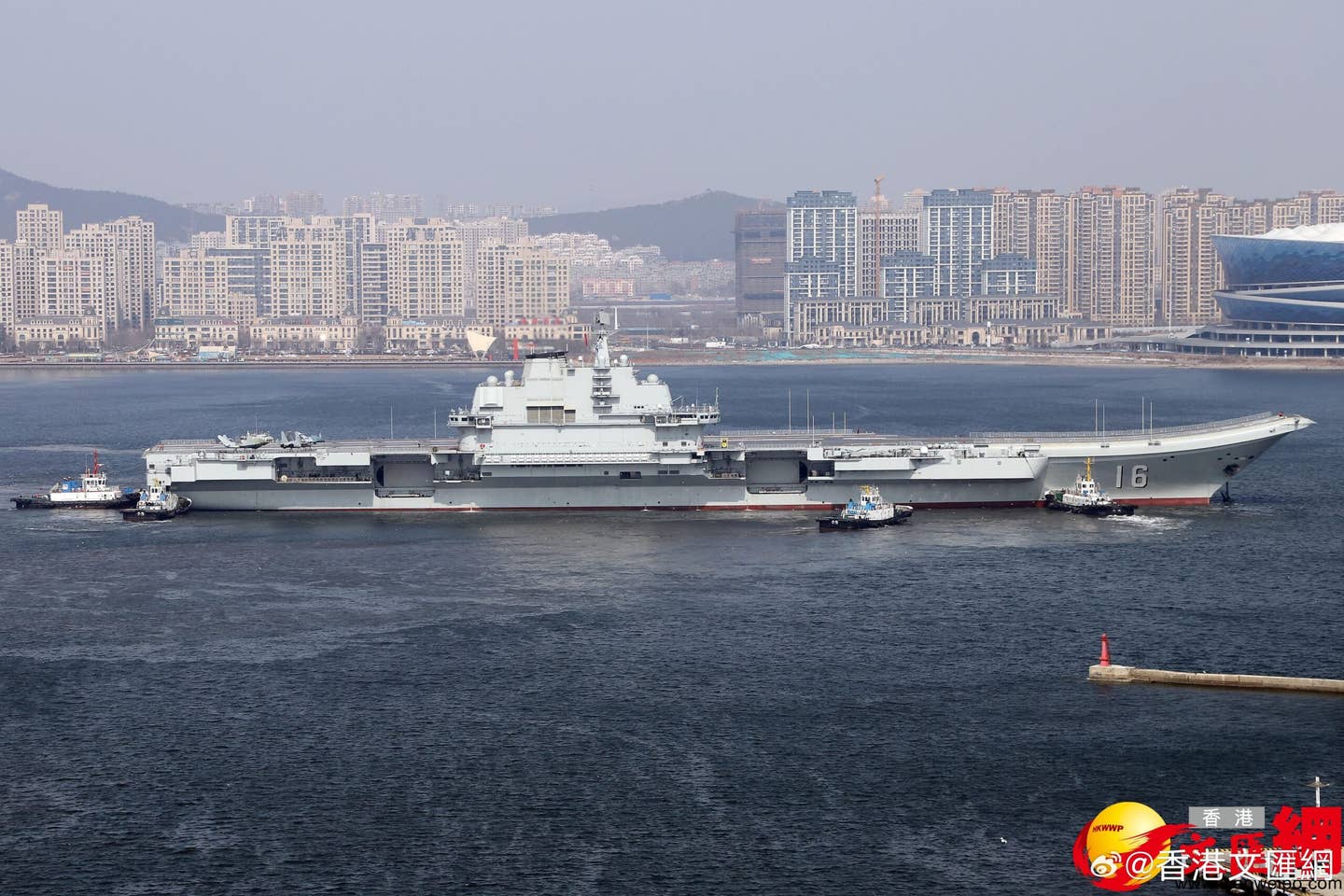 The <em>Liaoning</em> heads out to sea with mockups of the J-35 and a J-15 variant seen at the rear of the deck. <em>Chinese internet via X</em>