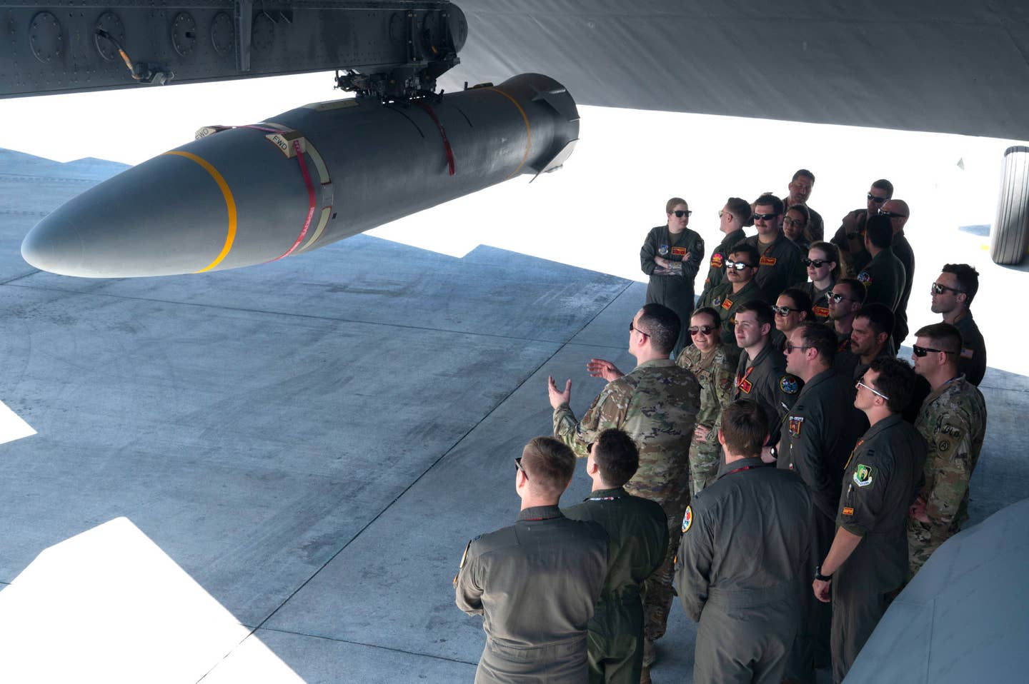 A live AGM-183A ARRW hypersonic missile seen under the wing of a B-52H bomber at Andersen Air Force Base on Guam on February 27, 2024. <em>USAF</em>