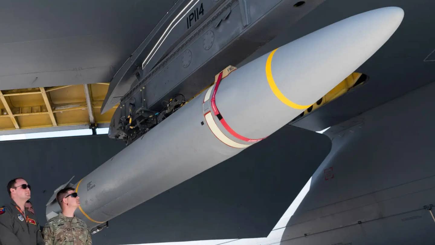The live AGM-184A ARRW missile seen under the wing of a B-52H bomber at Andersen Air Force Base on Guam on February 27, 2024. <em>USAF</em>