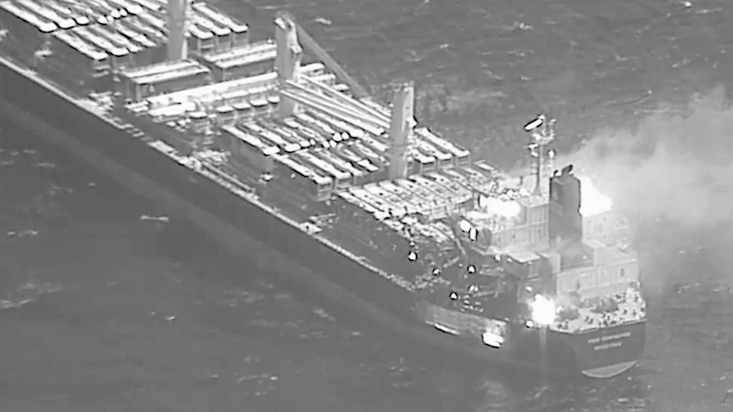The commercial cargo ship True Confidence seen on fire after being struck by a Houthi missile in the Gulf of Aden in March 2024. <em>CENTCOM</em>