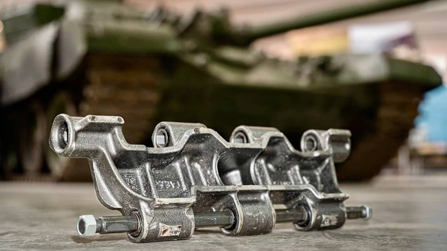 A close-up shot of part of a T-72 tank track, produced by Cook Defence Systems