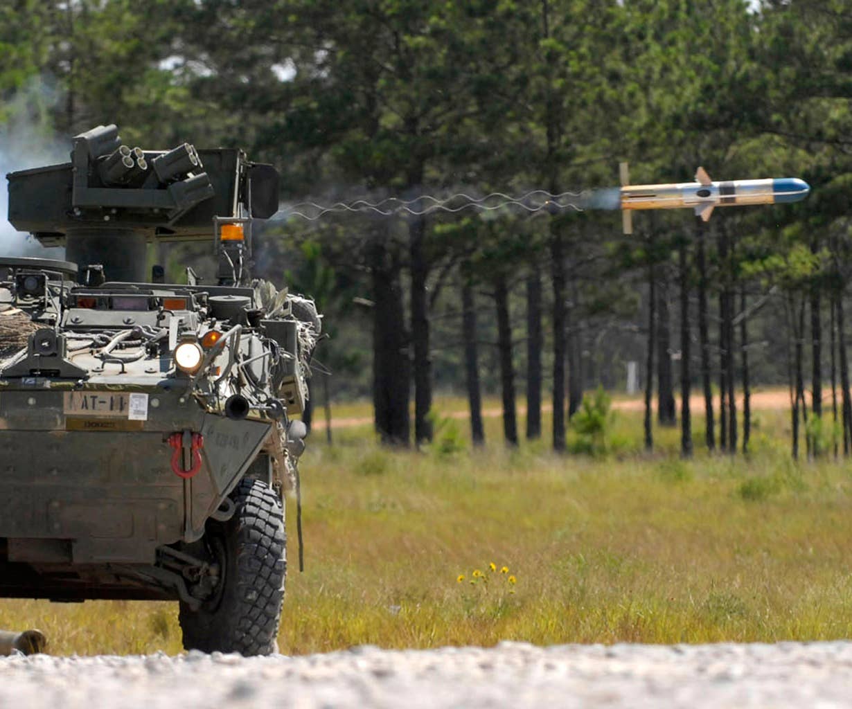 A Stryker vehicle belonging to the 4th Stryker Brigade Combat Team, 2nd Infantry Division, based out of Ft. Lewis, Wash., fires a tube-launched, optically-tracked, wire-guided missile at a range during the brigade's rotation through Fort Polk's Joint Readiness Training Center. (U.S. Army photo by Pfc. Victor J. Ayala)