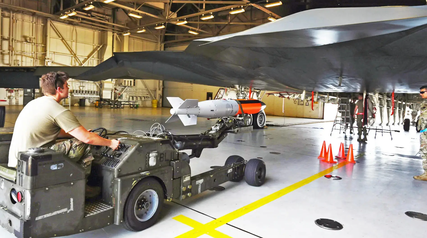 U.S. Air Force personnel load a test version of the B61-12 onto a B-2A Spirit bomber.&nbsp;<em>U.S. Air Force</em>