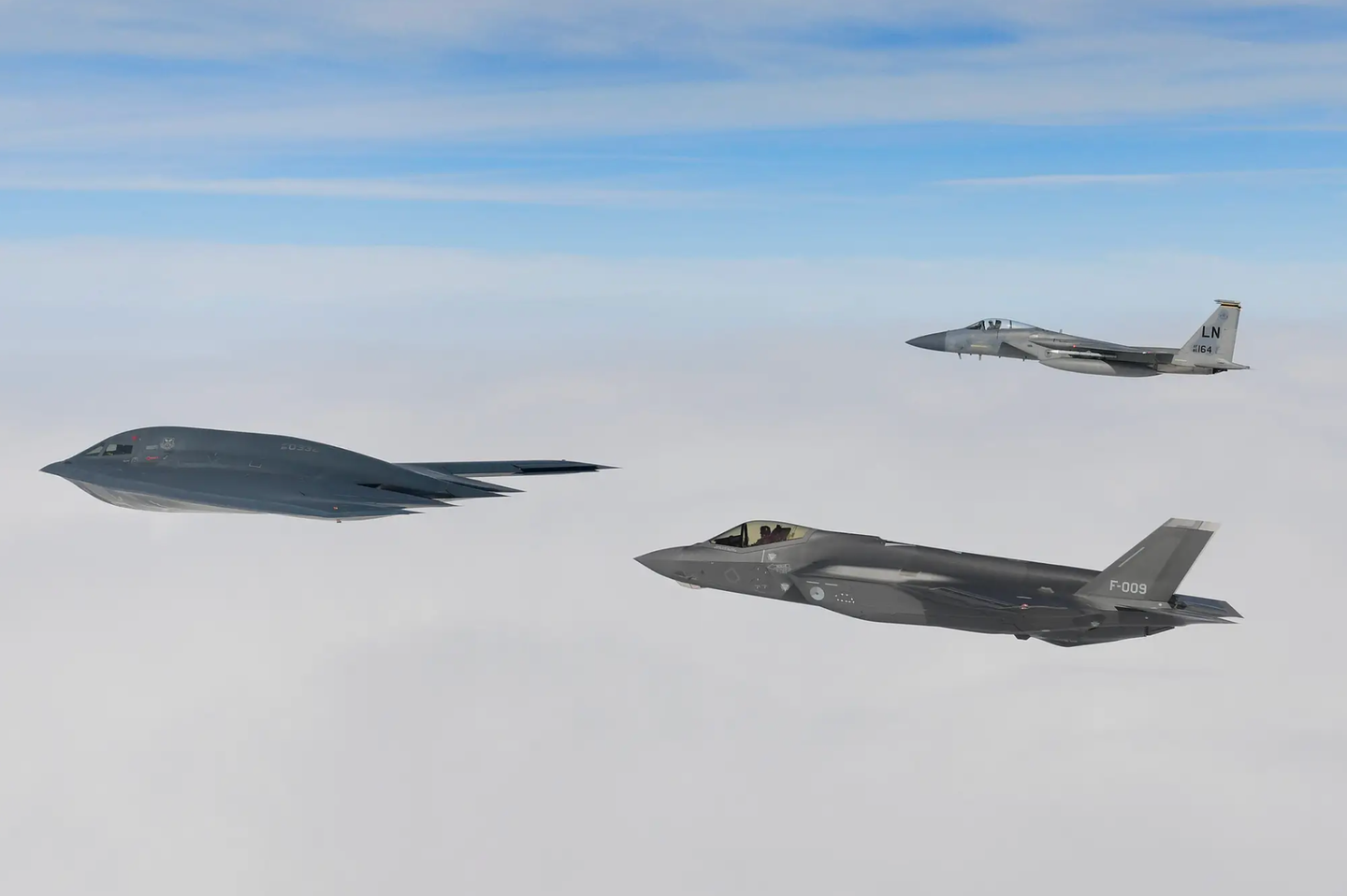 A B-2A Spirit bomber assigned to the 509th Bomb Wing, a Royal Netherlands Air Force F-35A, and a U.S. Air Force F-15C Eagle assigned to the 48th Fighter Wing, conduct aerial operations in support of Bomber Task Force Europe 20-2 over the North Sea March 18, 2020.&nbsp;<em>U.S. Air Force photo/Master Sgt. Matthew Plew</em>