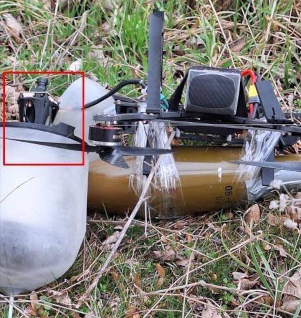 A view of the first-person view-type drone with the apparent fiber optic control line that was recovered in Ukraine. (Serhiy Flesh/Telegram)