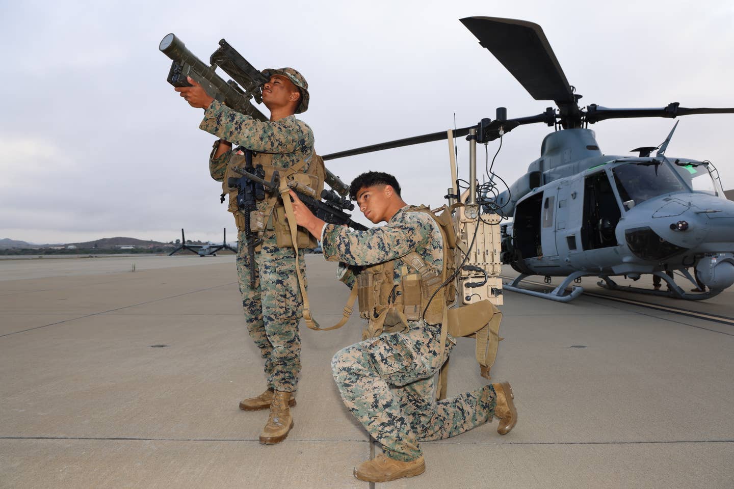 LAAD Marines with an FIM-92 Stinger SAM, M4, and an electronic warfare backpack. (James Deboer)