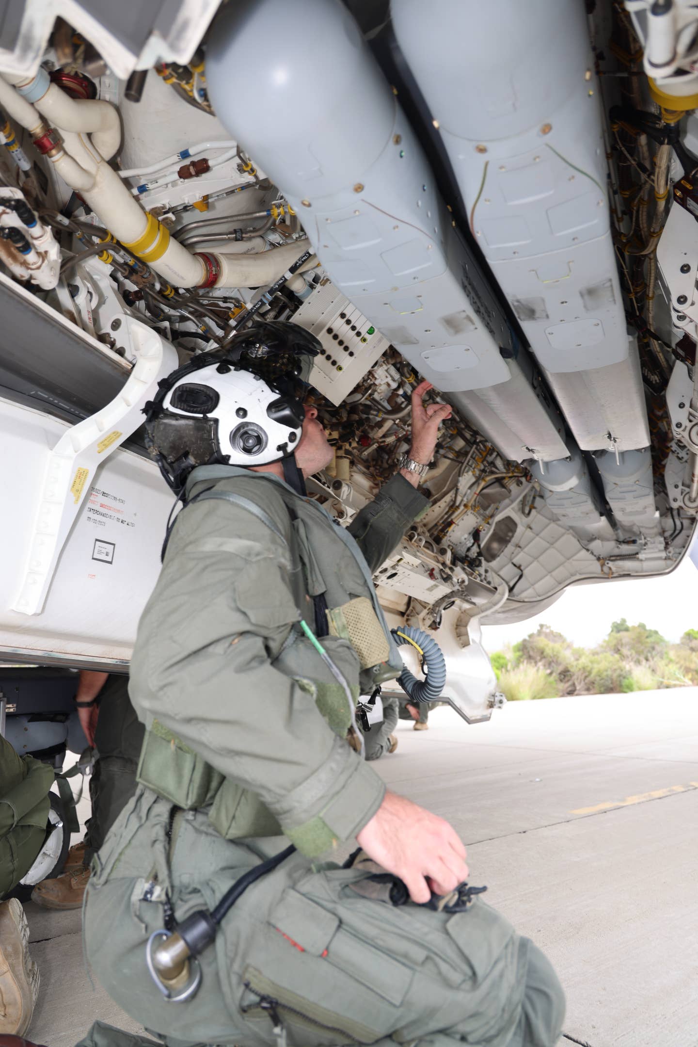 A VMX-1 pilot inspects inert SDB IIs loaded into the F-35B's weapons bay during Obsidian Iceberg, (James Deboer)