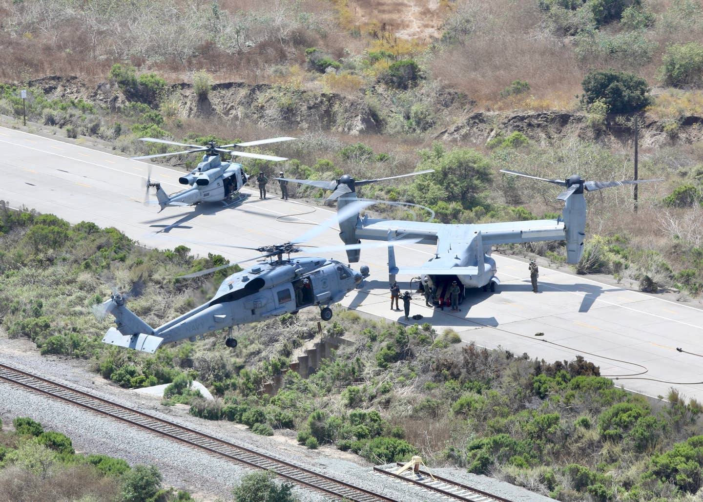 A Navy MH-60R arrives at VMX-1's mock forward operating area during Obsidian Iceberg. (James Deboer)