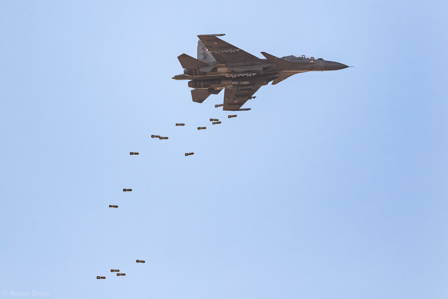 The dramatic sight of no less than 22 bombs leaving the racks of a Su-30MKI. <em>Angad Singh</em>