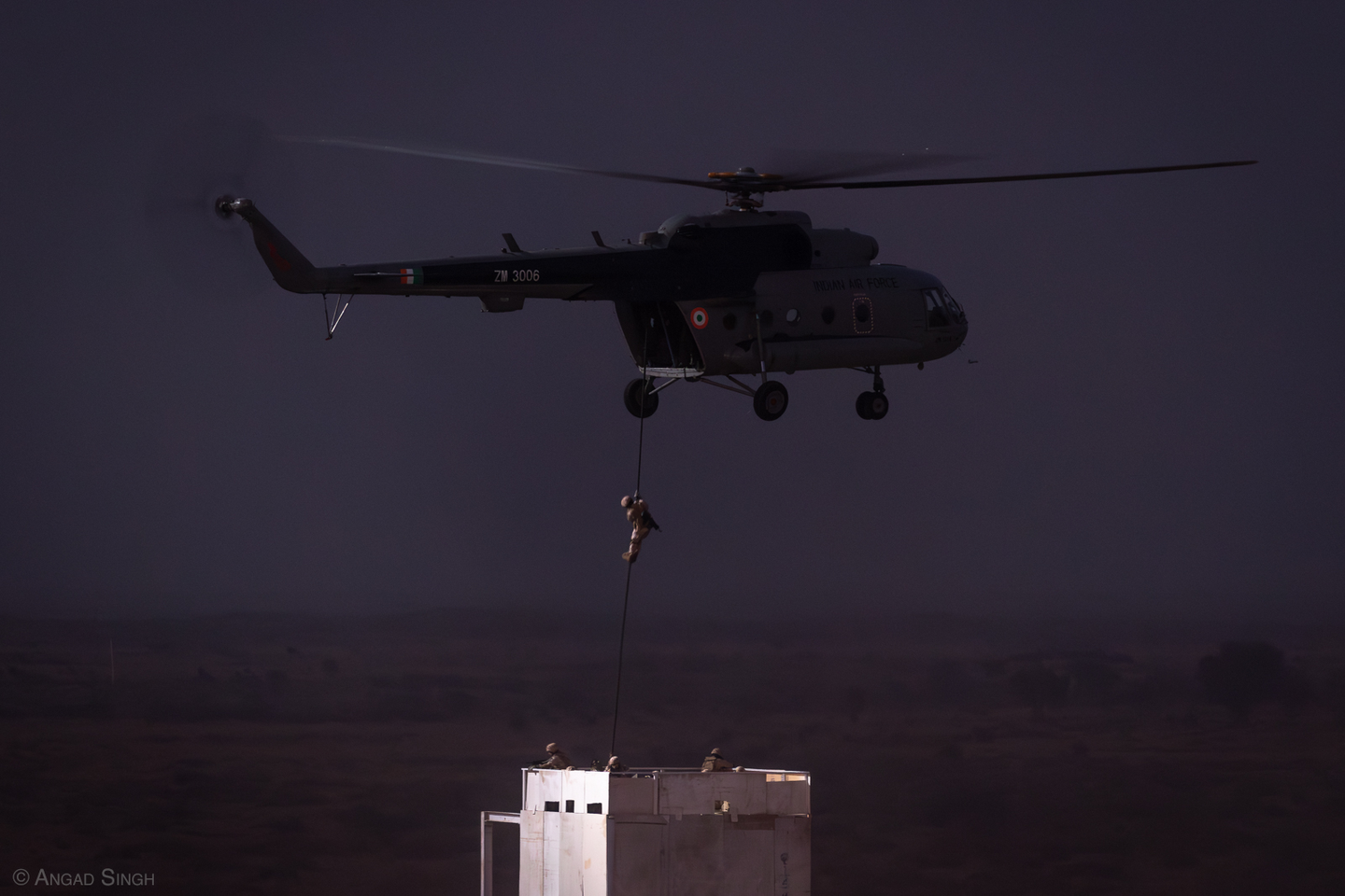 IAF special forces (‘Garuds’) fast-roping from a Mi-17 for a building intervention demo. <em>Angad Singh</em>