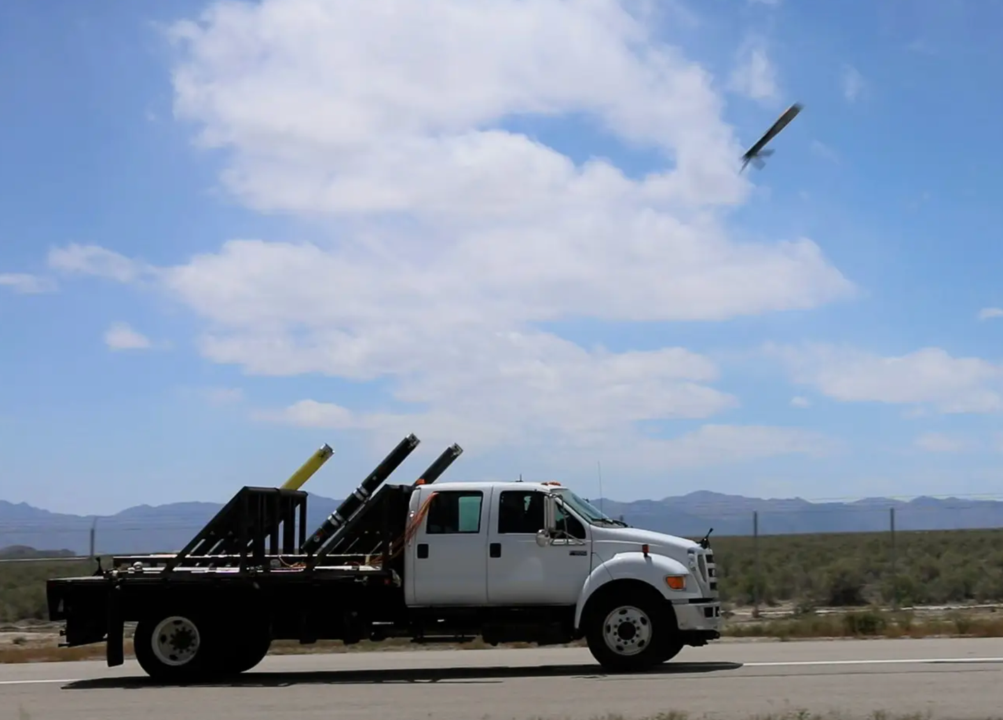 A truck with multiple ALE launchers sends a drone skyward during EDGE 22.&nbsp;<em>U.S. Army</em>