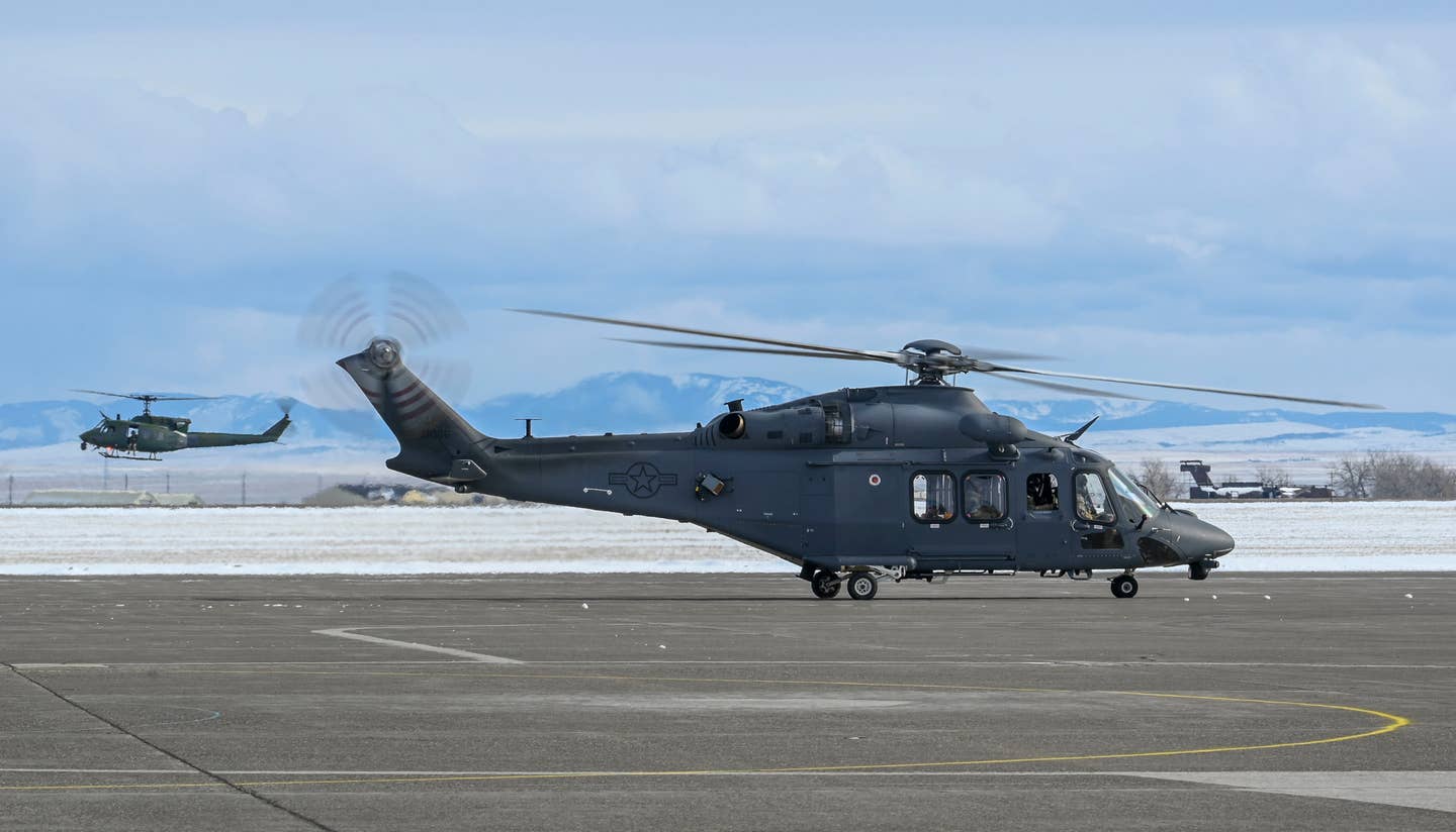 The first AFGSC MH-139A at Malmstrom Air Force Base in Montana, with a UH-1N seen flying in the background. <em>USAF</em>