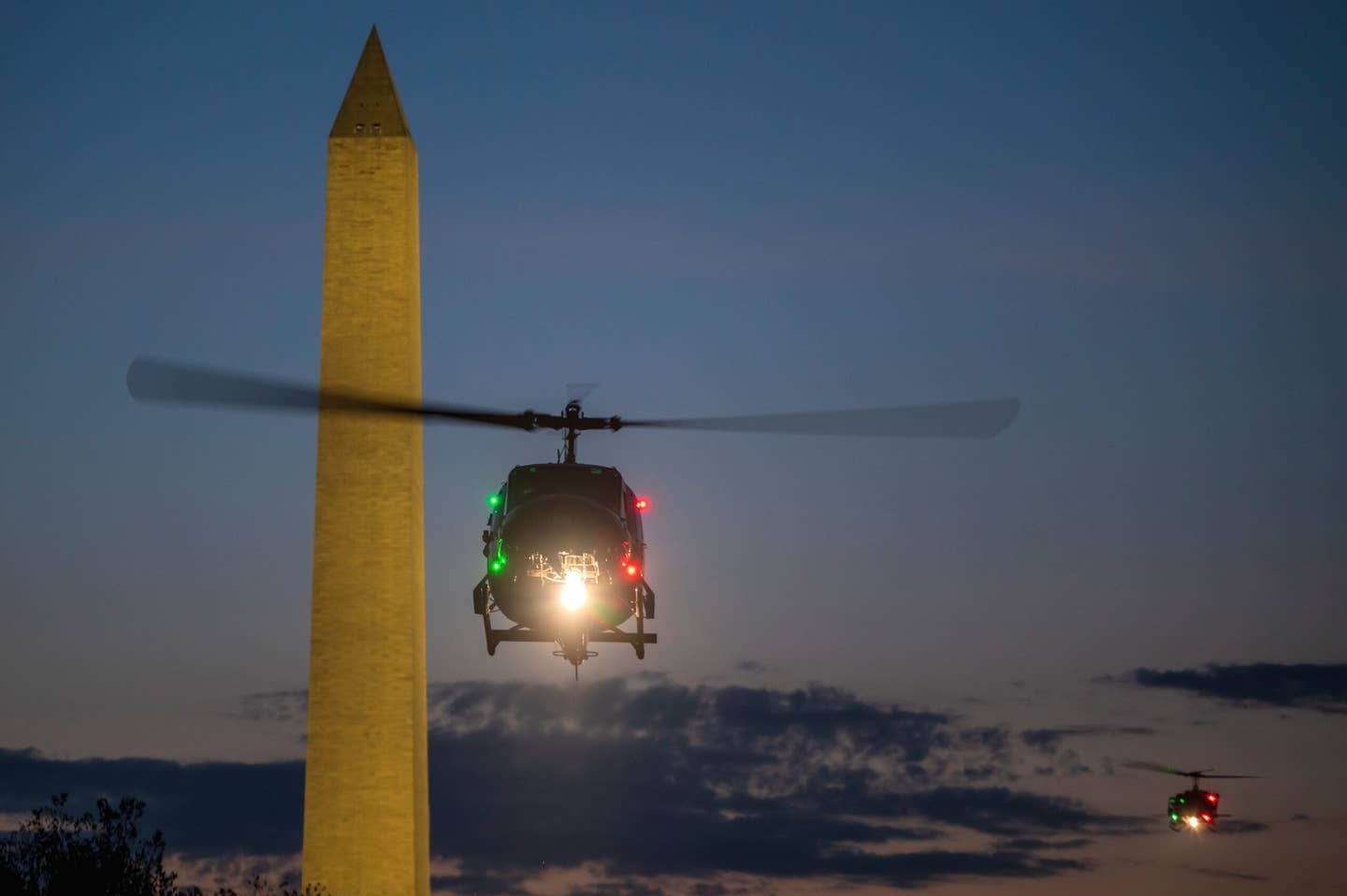 UH-1Ns from the 1st Helicopter Squadron prepare to land on the National Mall in Washington, D.C., during a training exercise in 2023. <em>USAF</em>