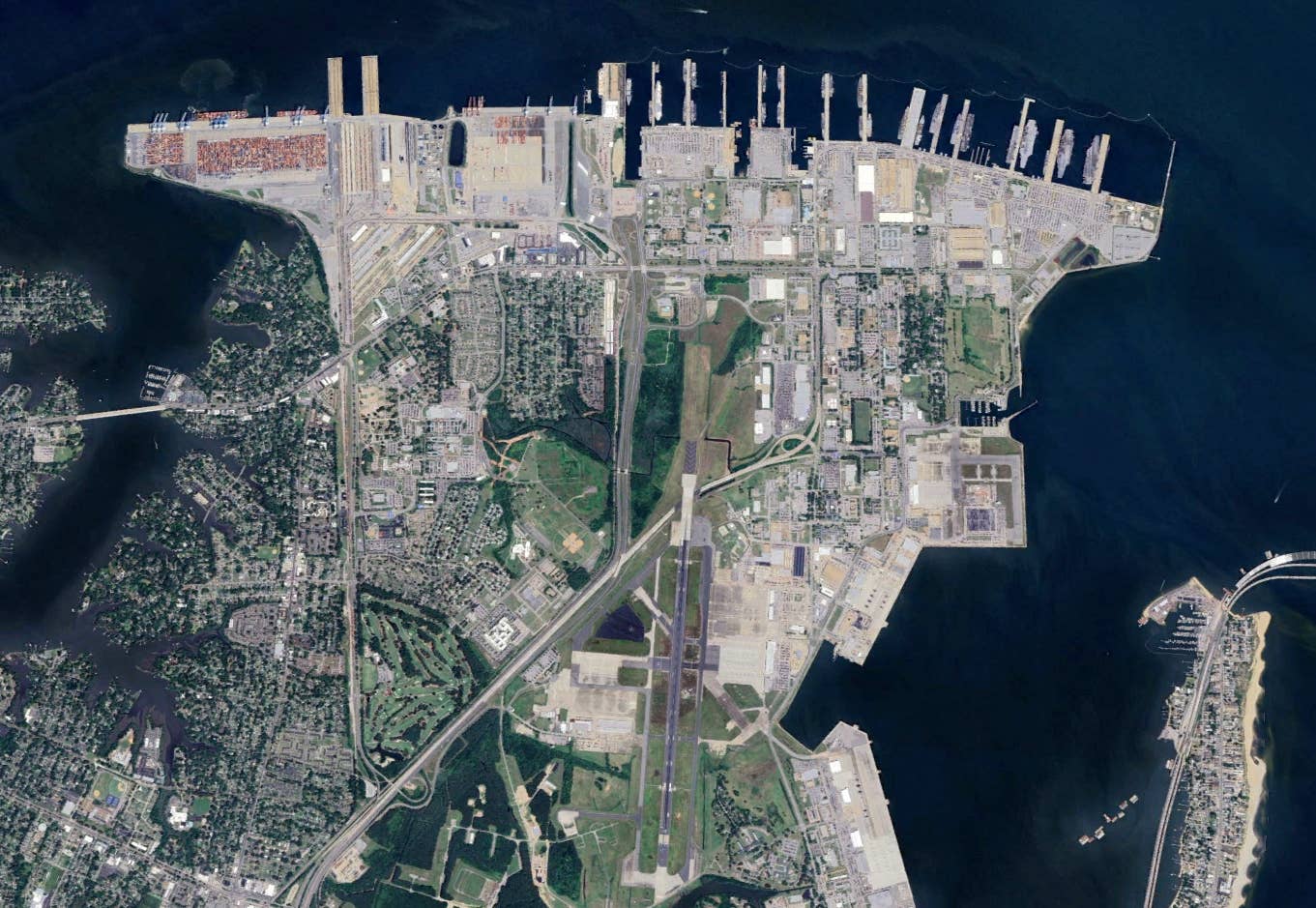 A satellite image showing Naval Base Norfolk and Naval Air Station Norfolk, collectively known as Naval Station Norfolk. <em>Google Earth</em>