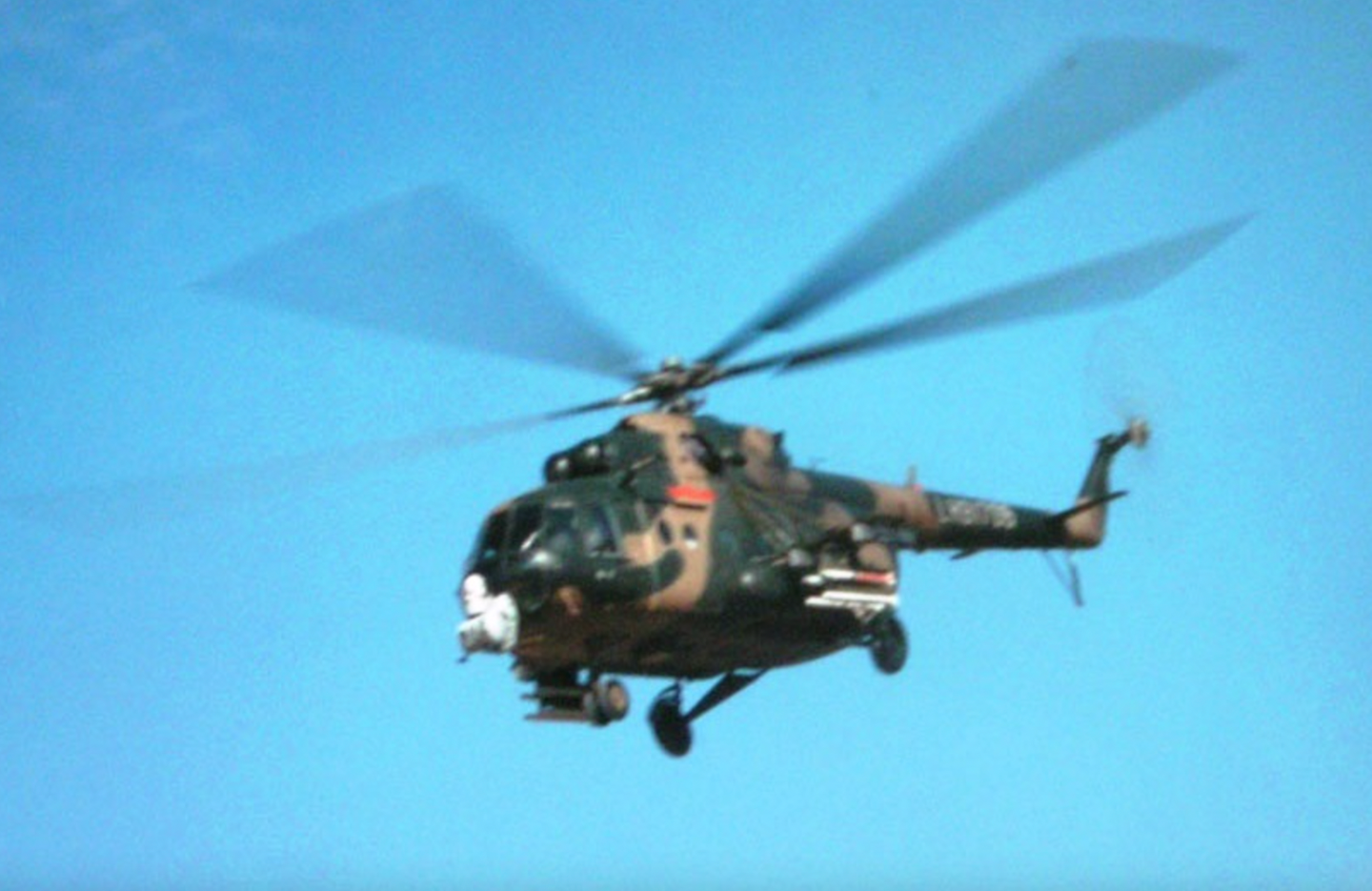 A rare, if poor-quality, shot of a PLA Mi-17 armed with TY-90 air-to-air missiles.&nbsp;<em>Chinese internet</em>