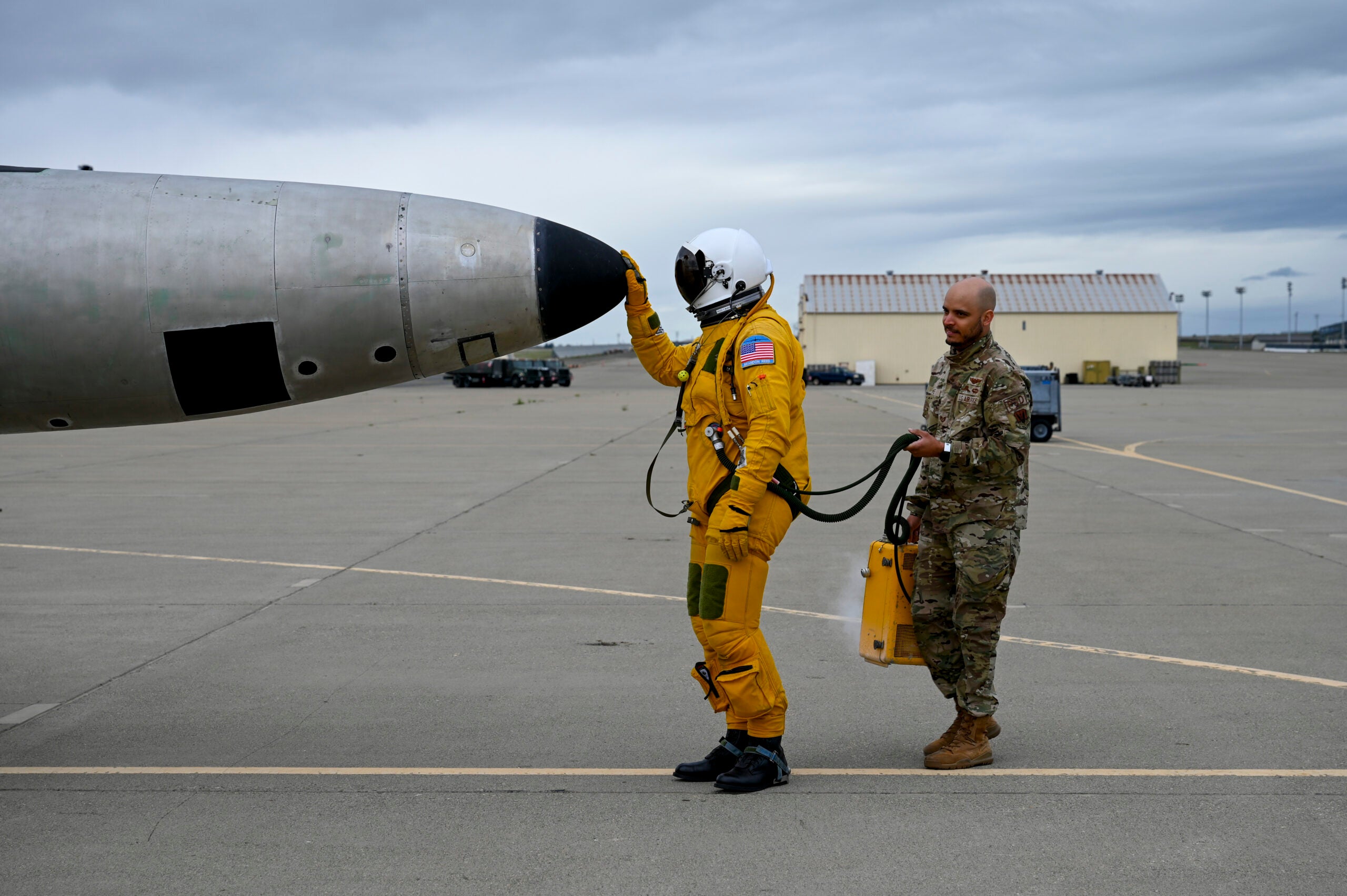 U.S. Air Force Maj. Brandon, Air Force Life Cycle Management Center (AFLCMC) Detachment 4 chief of flight test operations, touches the nose of TU-2S Dragon Lady 1078 before piloting aircraft 1078 at Beale Air Force Base, California, Feb. 29, 2024. Aircraft 1078 was involved in an accident in 2021 that left it unable to move to U.S. Air Force Plant 42 in Palmdale, California, where normal Program Depot-level Maintenance for U-2’s occur, and after passing low flight and high flight tests, was able to fly to Palmdale to be painted black and returned to service. (U.S. Air Force photo by Senior Airman Alexis Pentzer)