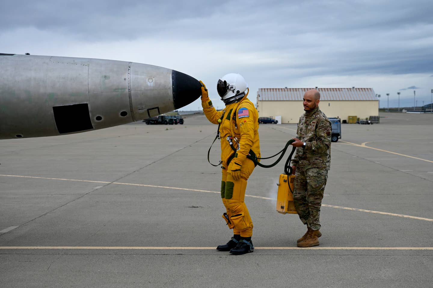 U.S. Air Force Maj. Brandon, Air Force Life Cycle Management Center (AFLCMC) Detachment 4 chief of flight test operations, touches the nose of TU-2S Dragon Lady 1078 before piloting aircraft 1078 at Beale Air Force Base, California, February 29, 2024. <em>U.S. Air Force photo by Senior Airman Alexis Pentzer</em>