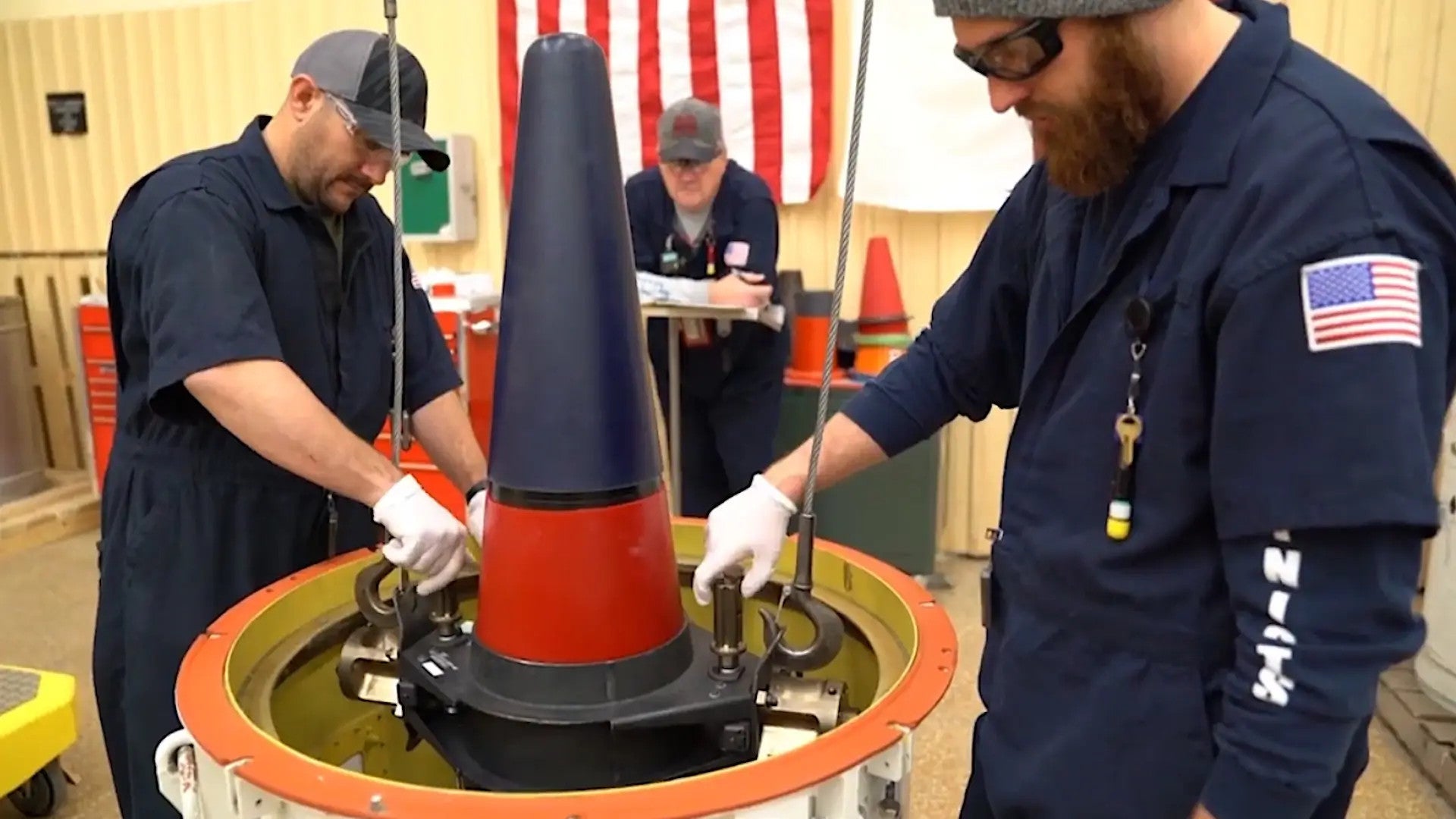 Personnel at the Pantex plant in Texas load a Mk 4A reentry vehicle containing a W76-1 warhead into a container for transport. The W76-2 warhead fits inside the same reentry vehicle., YouTube capture 