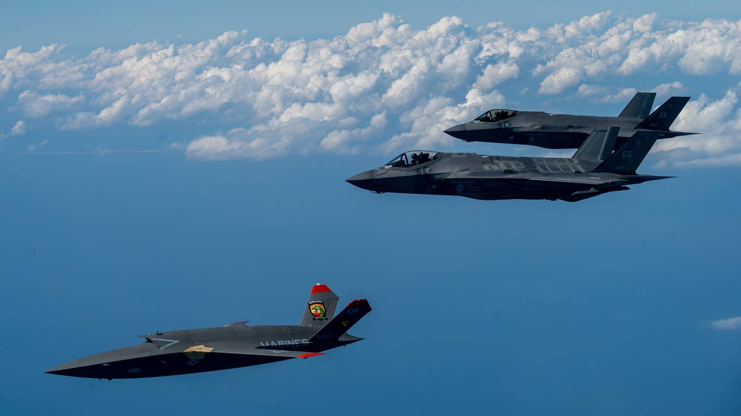 A U.S. Marine Corps XQ-58A Valkyrie, a highly autonomous, low-cost tactical unmanned air vehicle, conducts its second test flight with two U.S. Air Force F-35A Lightning II aircraft assigned to 33rd Fighter Wing, 96th Test Wing at Eglin Air Force Base, Fla., Feb. 23, 2023. (U.S. Air Force photo by Master Sgt. John McRell)
