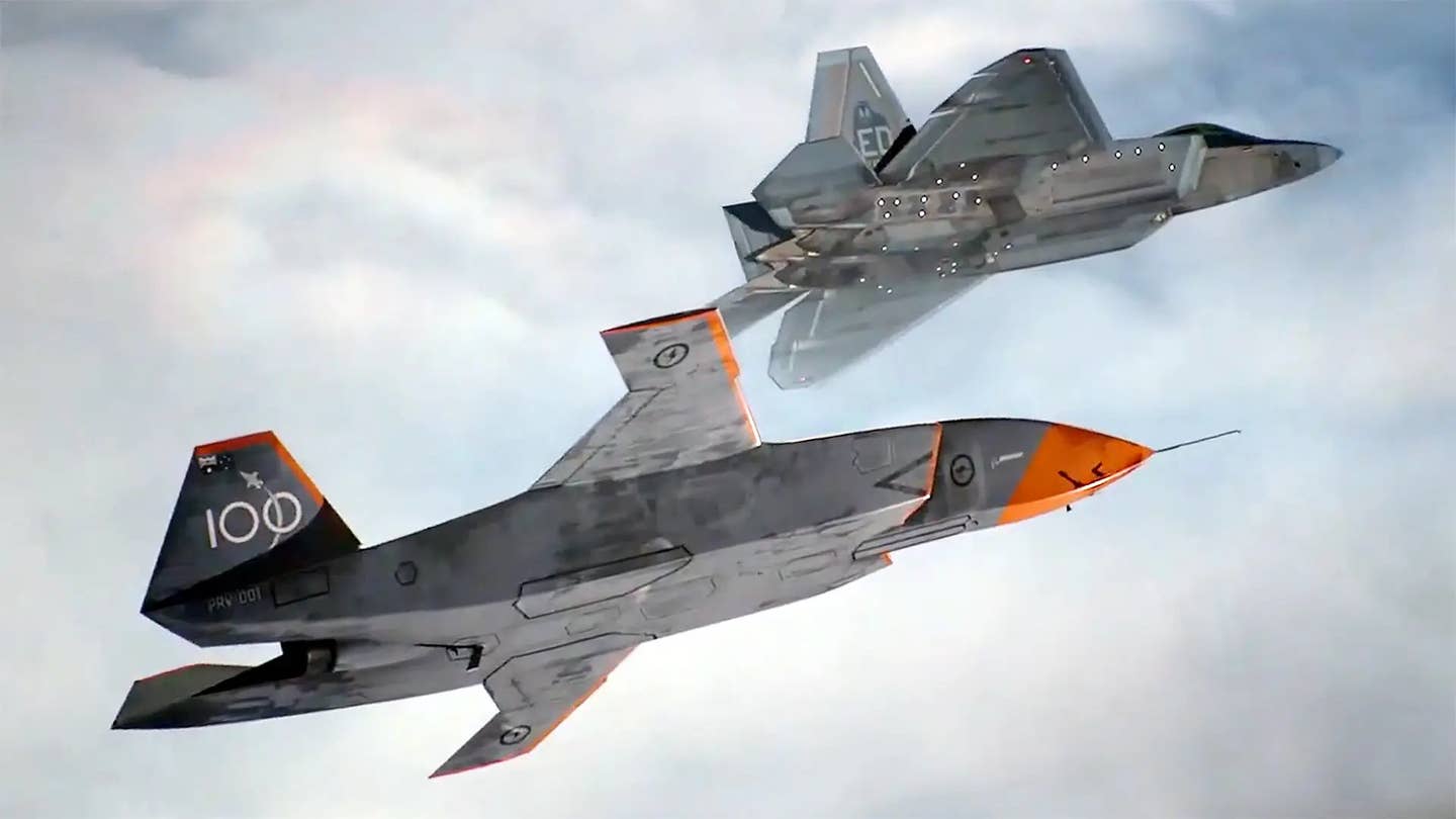 A US Air Force image depicting an MQ-28 Ghost Bat flying together with an F-22 Raptor stealth fighter. <em>USAF</em>