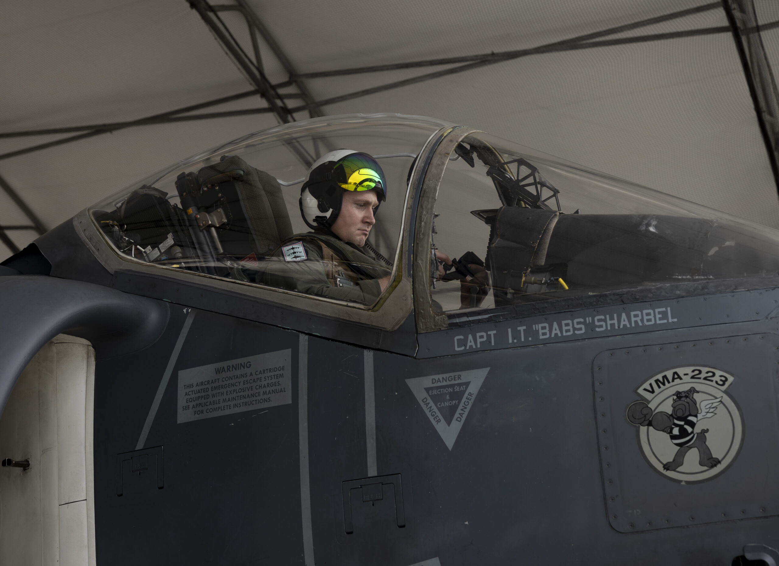 Capt. Corbett in the cockpit of an AV-8B of VMA-223. <em>U.S. Marine Corps photo by Staff Sgt. Daisha Ramirez</em>