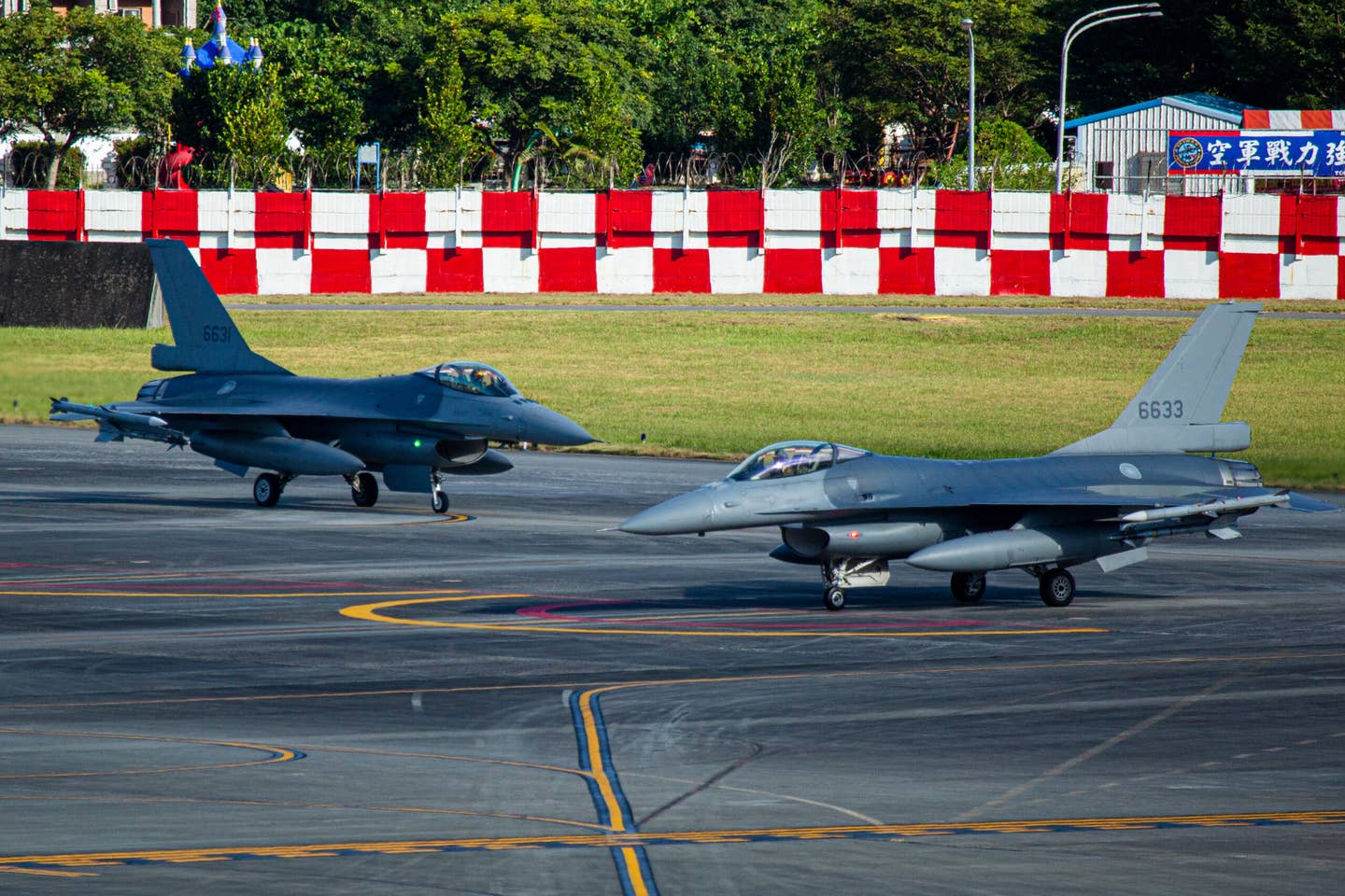 Taiwanese F-16s are seen before taking off from Hualien Air Base on August 6, 2022 in Hualien, Taiwan. <em>Photo by Annabelle Chih/Getty Images</em>