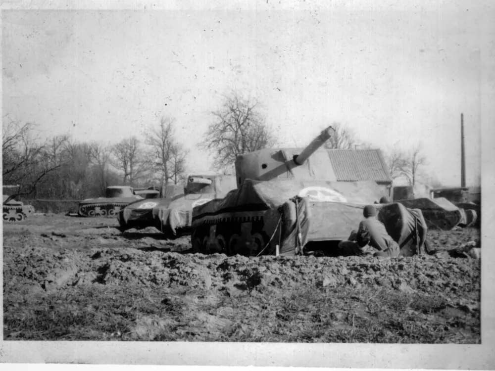 Men of the 23rd Headquarters Special Troops pictured with inflatable tanks, jeeps and artillery, date unknown. <em>National World War II Museum</em>