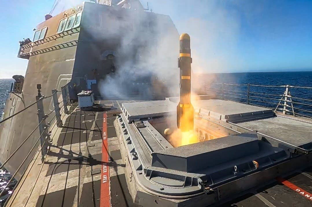 An AGM-114L Longbow Hellfire missile launches from the Surface-To-Surface Missile Module (SSMM) aboard the <em>Independence</em> variant Littoral Combat Ship USS <em>Montgomery</em> (LCS-8). The missile exercise was the first proof-of-concept launch of the Longbow Hellfire missile against a land-based target. (U.S. Navy photo by Lt.j.g. Samuel Hardgrove)