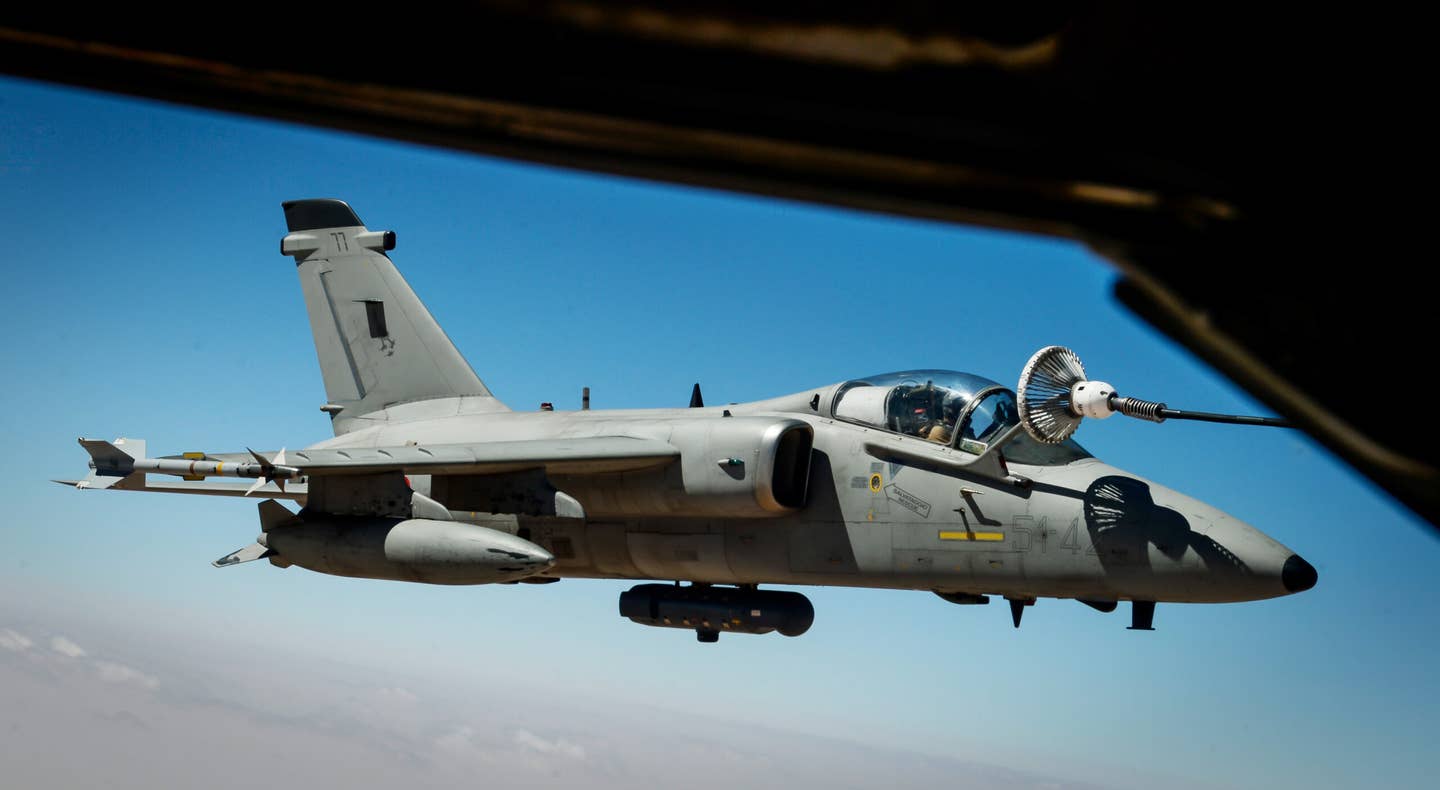An Italian Air Force AMX receives fuel from a KC-135 Stratotanker assigned to the 340th Expeditionary Air Refueling Squadron during a mission in support of Operation Inherent Resolve August 4, 2017. <em>U.S. Air Force photo by Staff Sgt. Michael Battles</em>