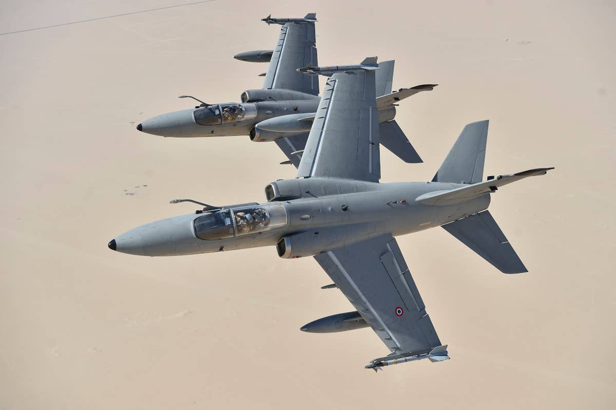 A pair of ACOL-upgraded A-11Bs of the Italian Air Force over the desert during Middle East operations. <em>Italian Air Force</em>