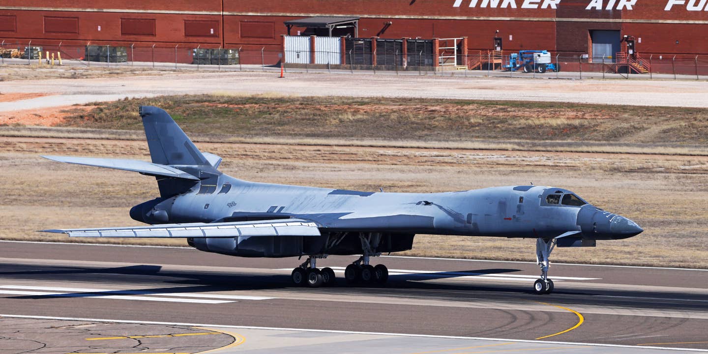 B-1B Lancer aircraft nicknamed “Lancelot,” touches down at Tinker Air Force Base, Oklahoma, Feb. 8, 2024. “Lancelot” is being regenerated to the active bomber fleet after previously being retired to the Aerospace Maintenance and Regeneration Group at Davis-Monthan Air Force Base in Arizona. Photo was redacted for security purposes.