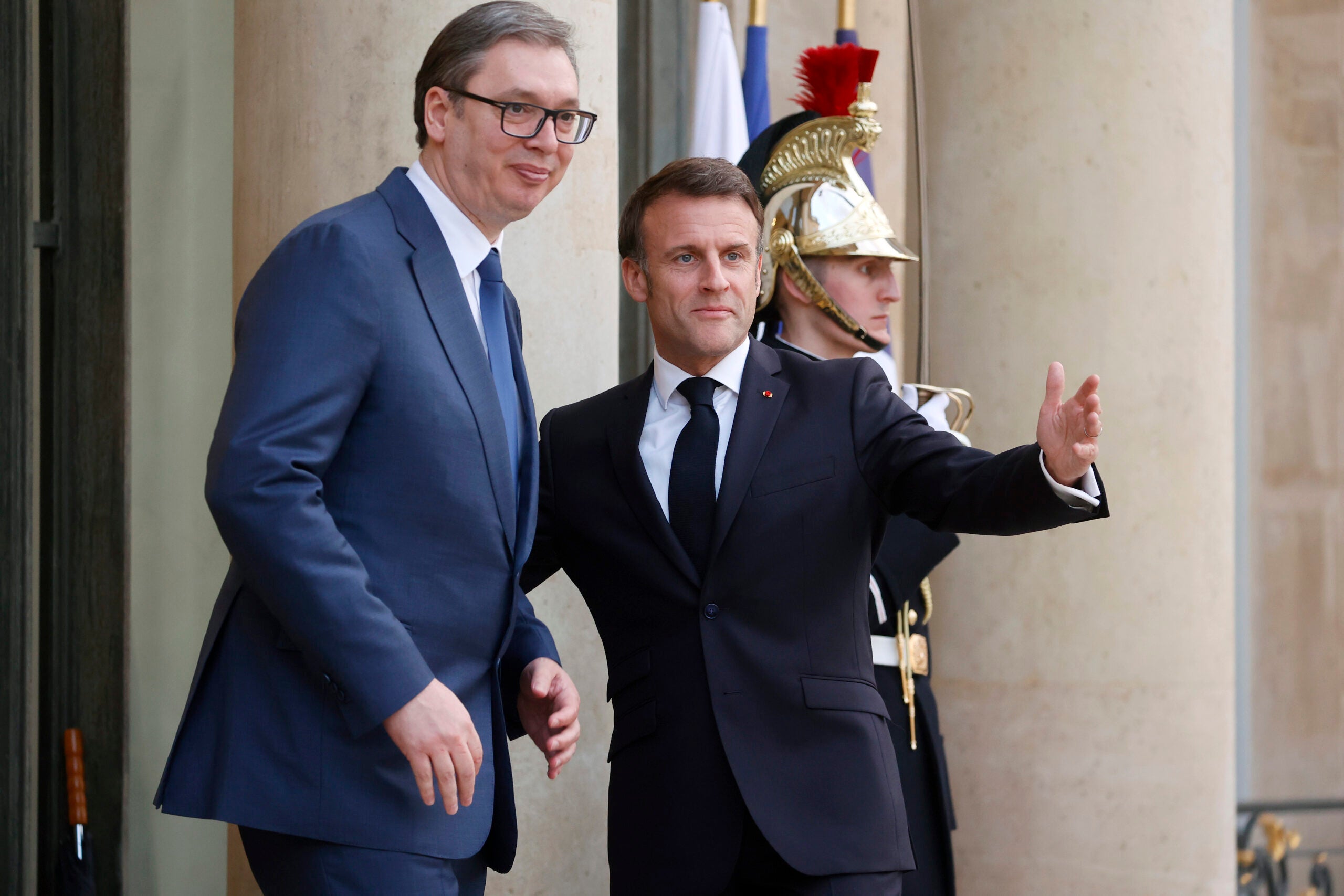PARIS, FRANCE - APRIL 08: France's President Emmanuel Macron (R) welcomes Serbia's President Aleksandar Vucic prior to their working dinner at the presidential Elysee Palace on April 08, 2024 in Paris, France. The President of France and the President of Serbia have met to discuss the European integration of Serbia and relations between Kosovo and Serbia. (Photo by Chesnot/Getty Images)
