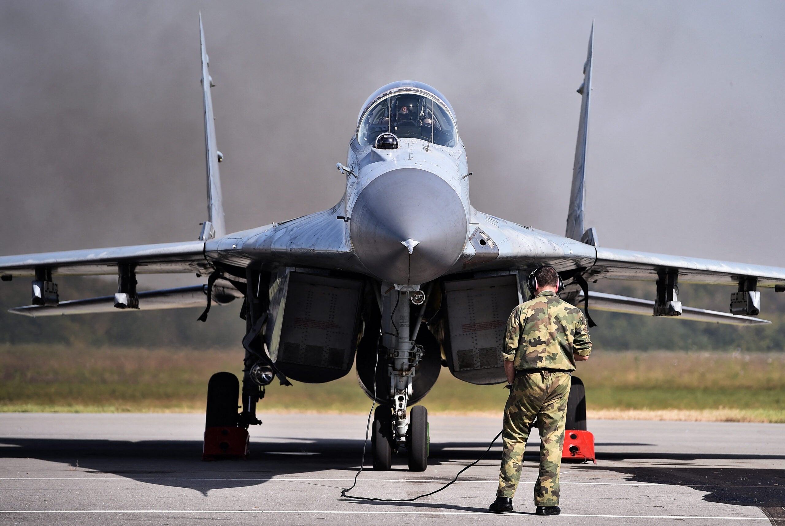 A Serbian Air Force MIG 29 prepares for takeoff at the Batajnica military airport near Belgrade on October 14, 2014. Various units of the Serbian Army prepare for the military parade marking the 70th anniversary of the liberation of Belgrade in WWII scheduled for October 16, with Russian President Vladimir Putin attending the ceremony.  AFP PHOTO / ANDREJ ISAKOVIC (Photo by ANDREJ ISAKOVIC / AFP) (Photo by ANDREJ ISAKOVIC/AFP via Getty Images)
