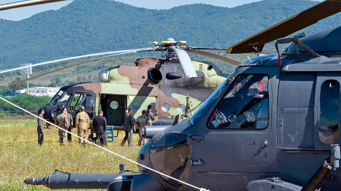 A U.S. Air Force HH-60G Pave Hawk and a Serbian Mi-17 Hip during CSAR maneuvers conducted over Serbia between August 7-11, 2023. <em>U.S. Air Force photo by Airman 1st Class Edgar Grimaldo </em>