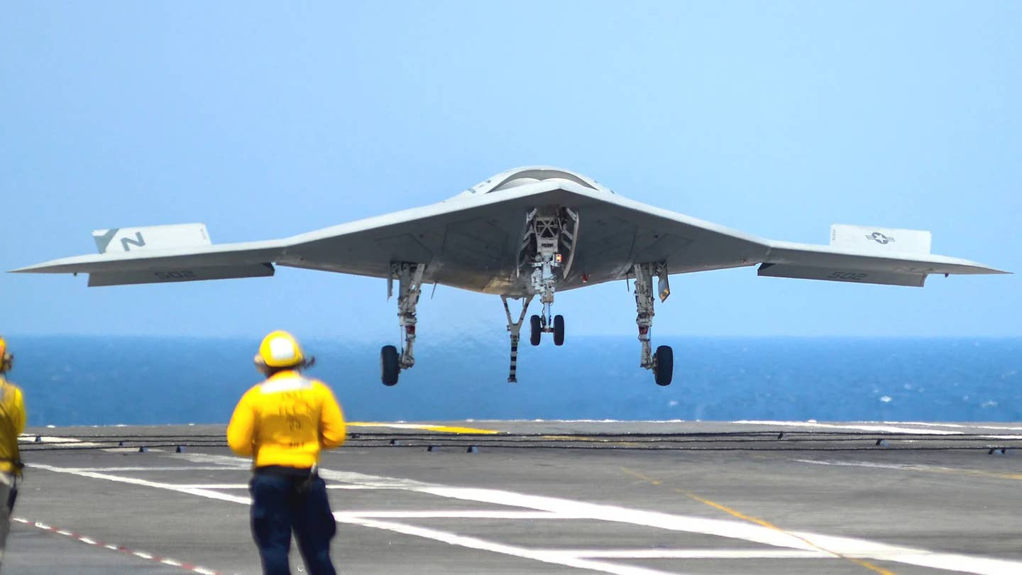 An experimental Northrop Grumman X-47B drone comes into land on the U.S. Navy supercarrier USS <em>Theodore Roosevelt </em>during a test in 2014. <em>USN</em>