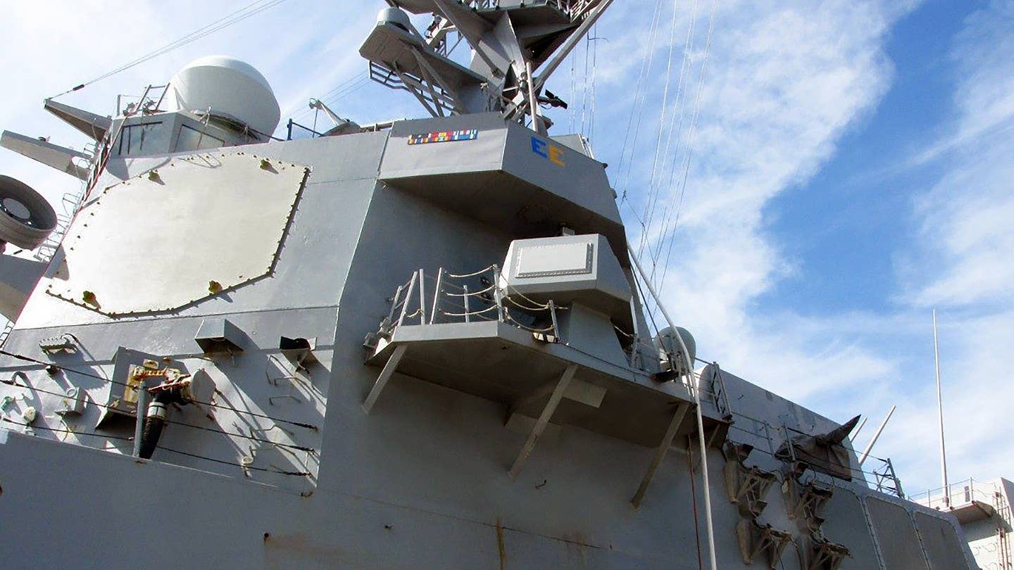 An antenna associated with the SEWIP Block II system can be seen at center here in this picture of a US Navy <em>Arleigh Burke</em> class destroyer. <em>USN</em>